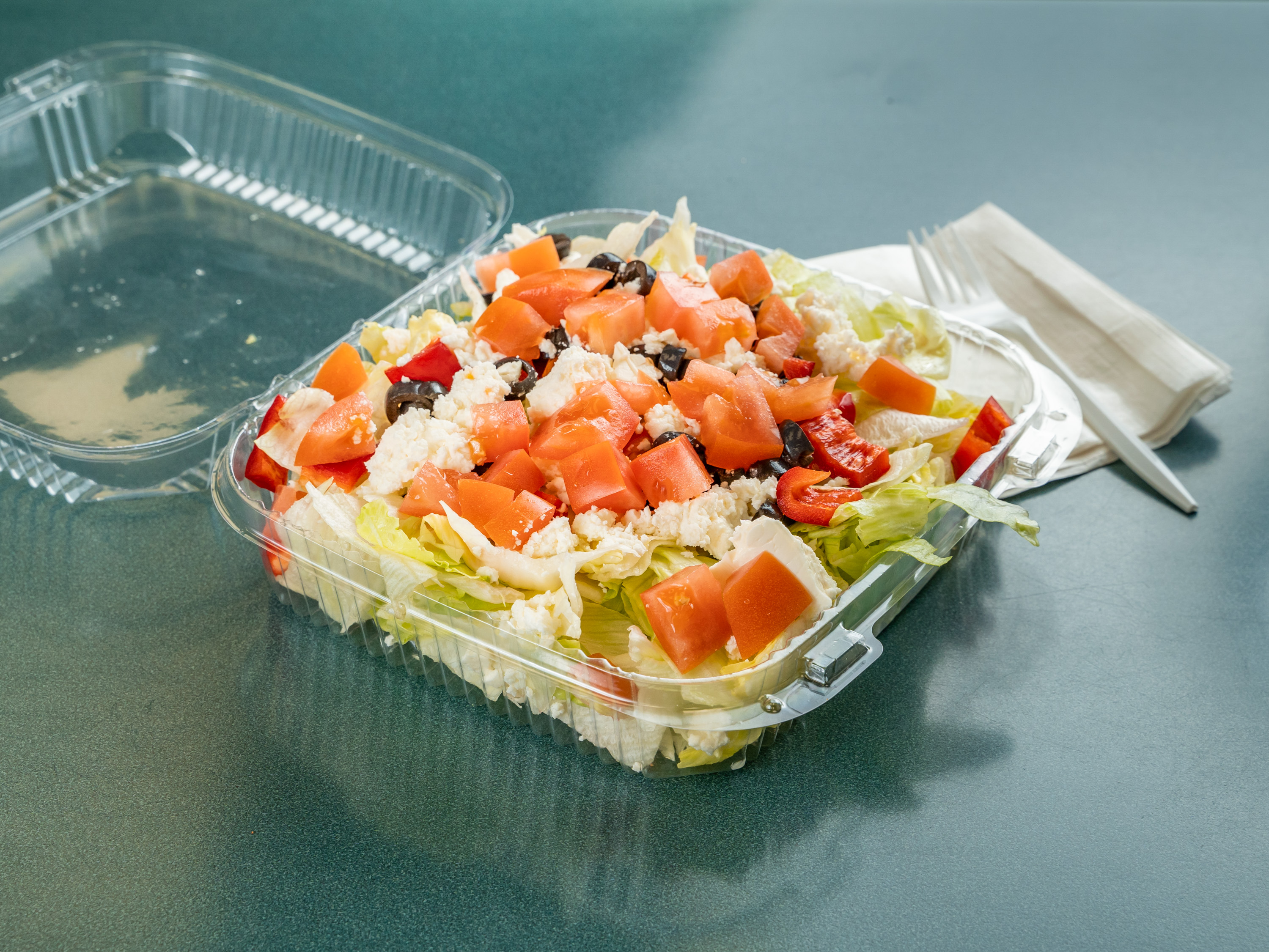 Order 86. Medium Greek Salad food online from Eternal Deli store, Williston Park on bringmethat.com