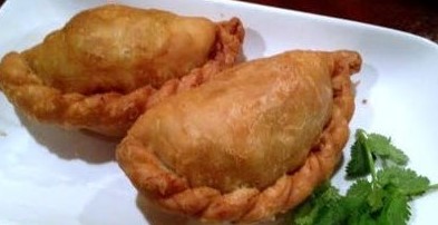 Order A9. 2 Malaysia Curry Puffs food online from Secret Recipe Asian Bistro store, Plano on bringmethat.com