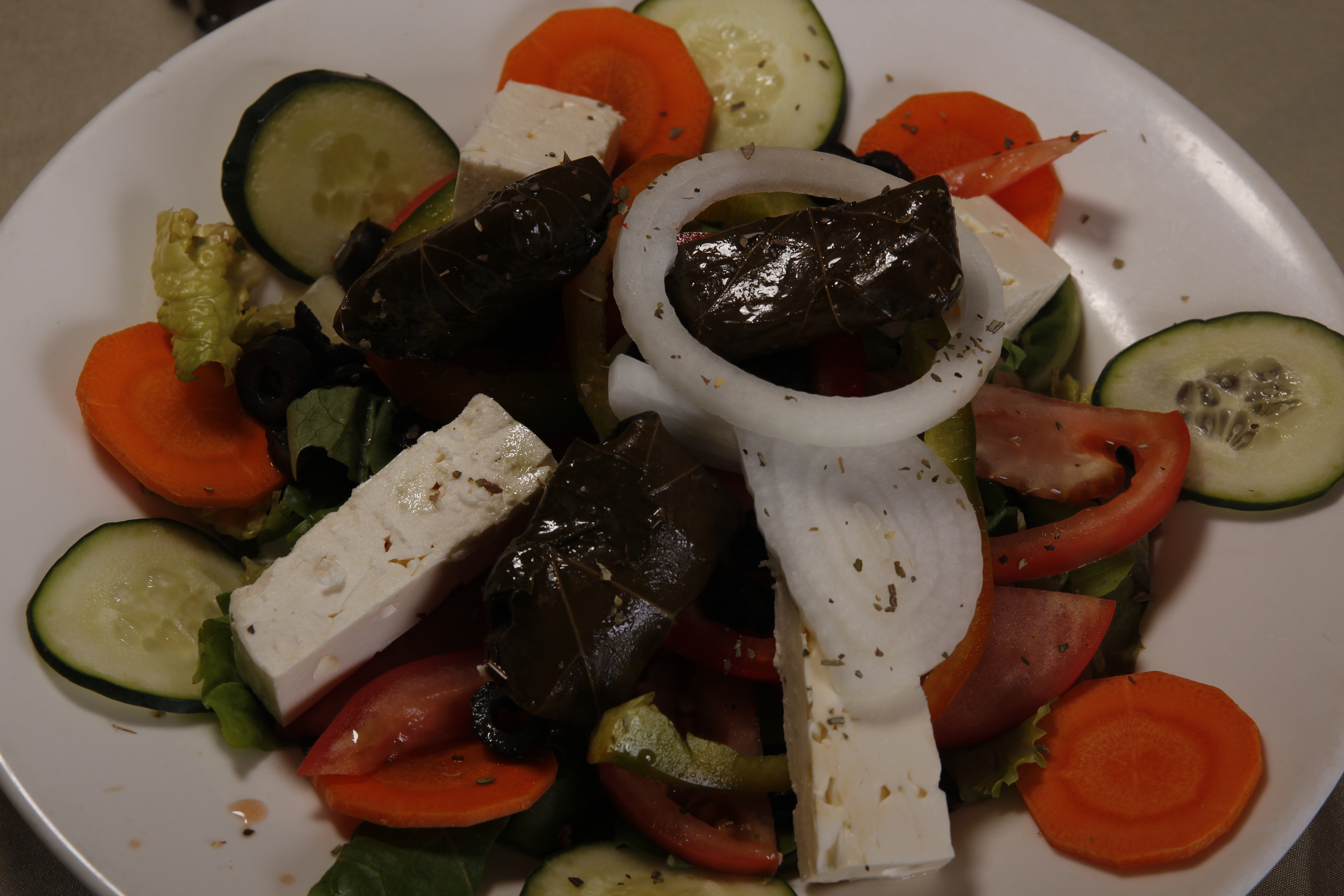 Order Greek Salad food online from Sutton cafe store, New York on bringmethat.com