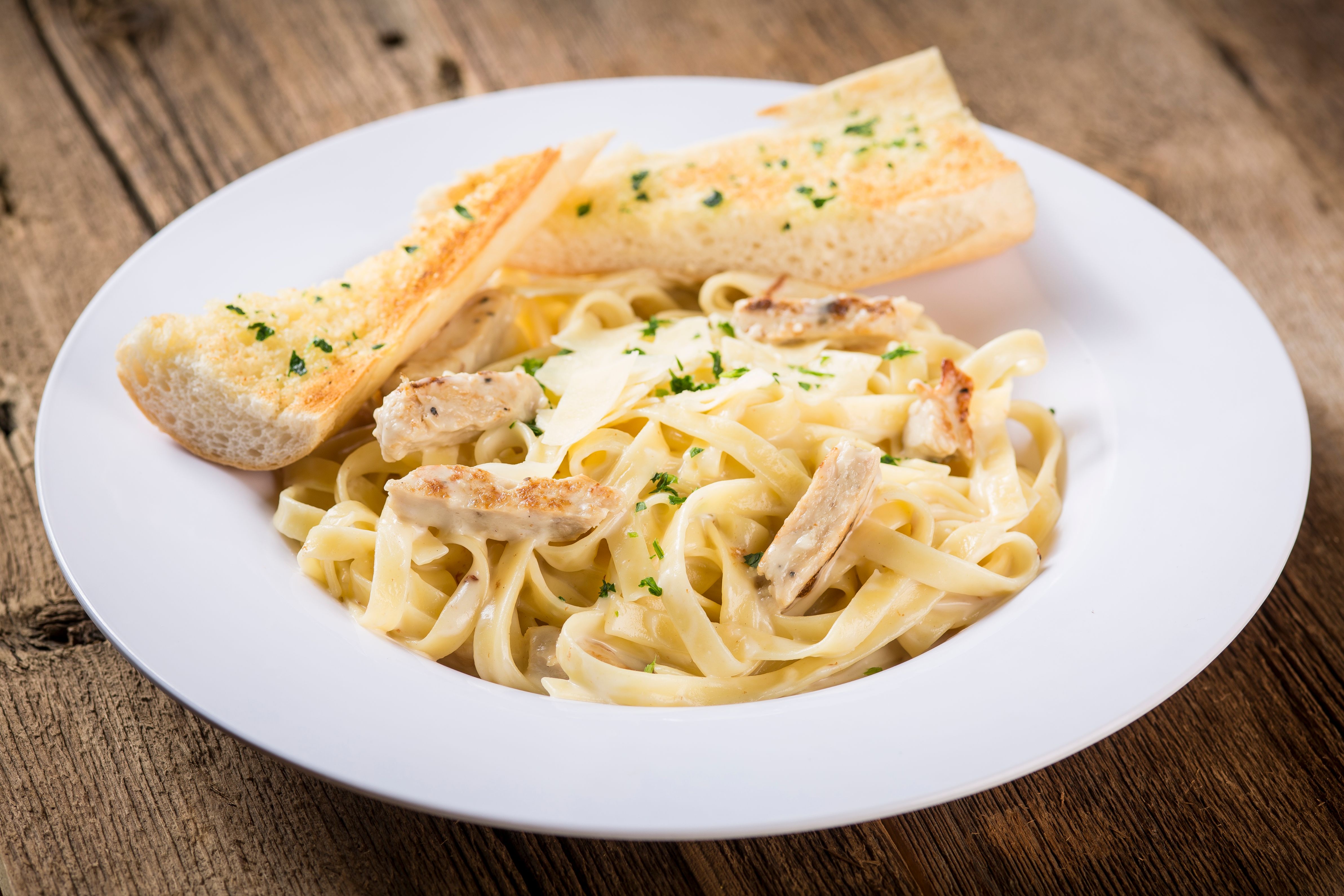 Order Fettuccine Alfredo with Grilled Chicken  food online from Rosati's Pizza store, Carol Stream on bringmethat.com