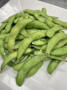 Order Steamed Young Edamame food online from Bistro 1051 store, Clark on bringmethat.com
