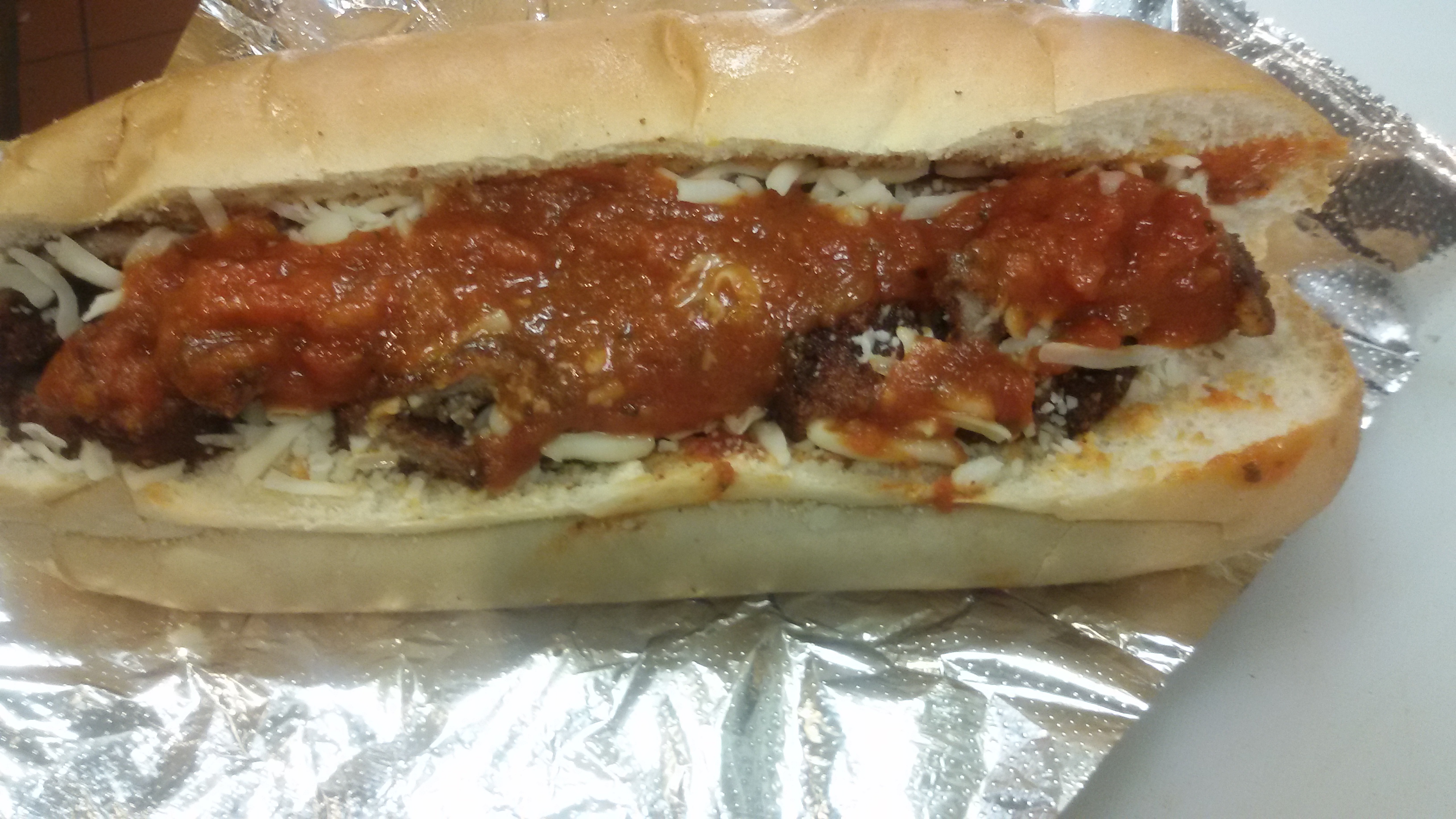 Order Chicken Parmesan Hot Sub food online from Brothers Pizza store, Tyngsboro on bringmethat.com