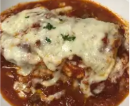 Order Meat Lasagna food online from White Cottage store, Wood Dale on bringmethat.com