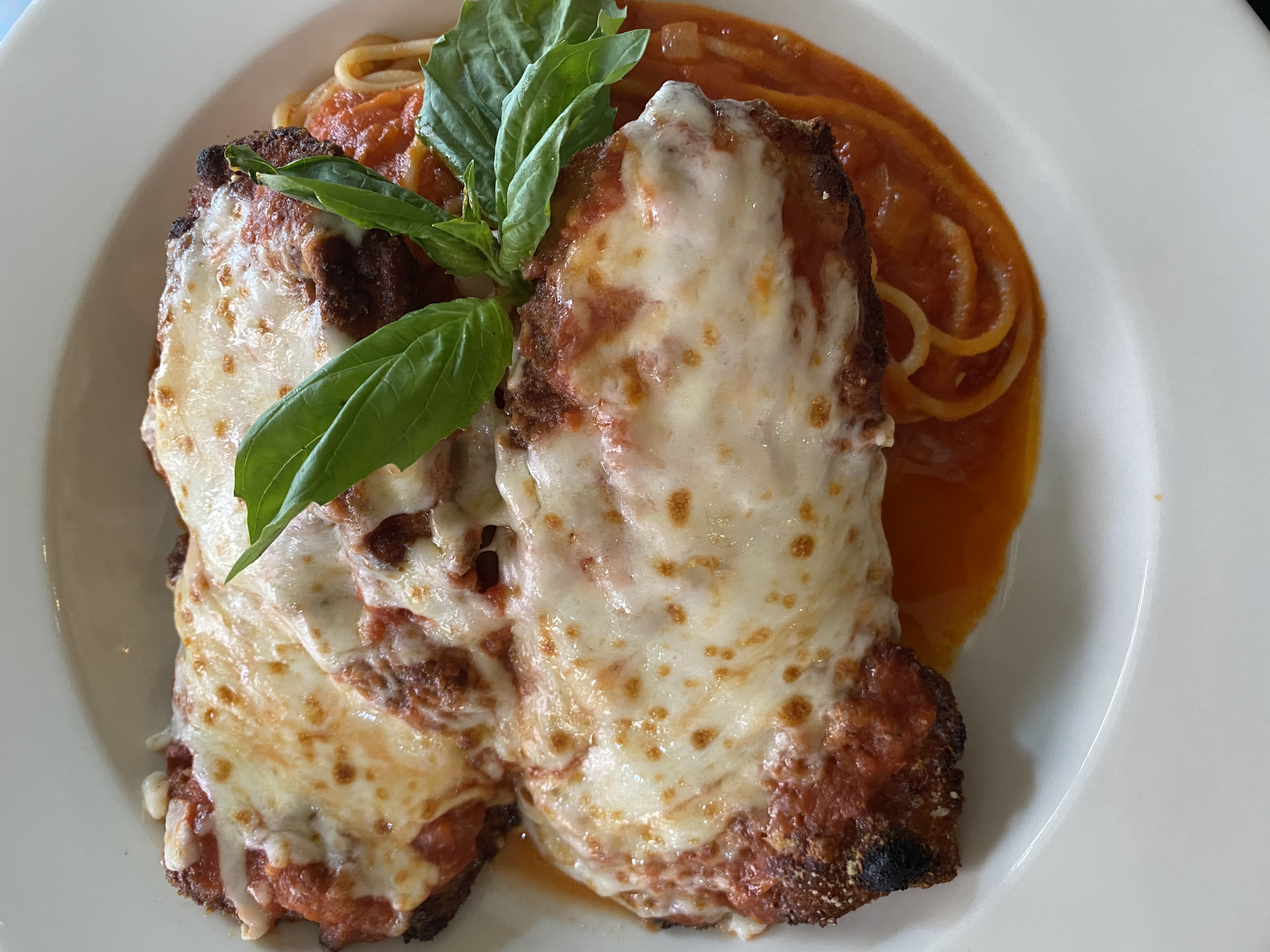 Order Chicken Parmesan w/ Spaghetti Pomodoro food online from Il Corallo Trattoria store, New York on bringmethat.com