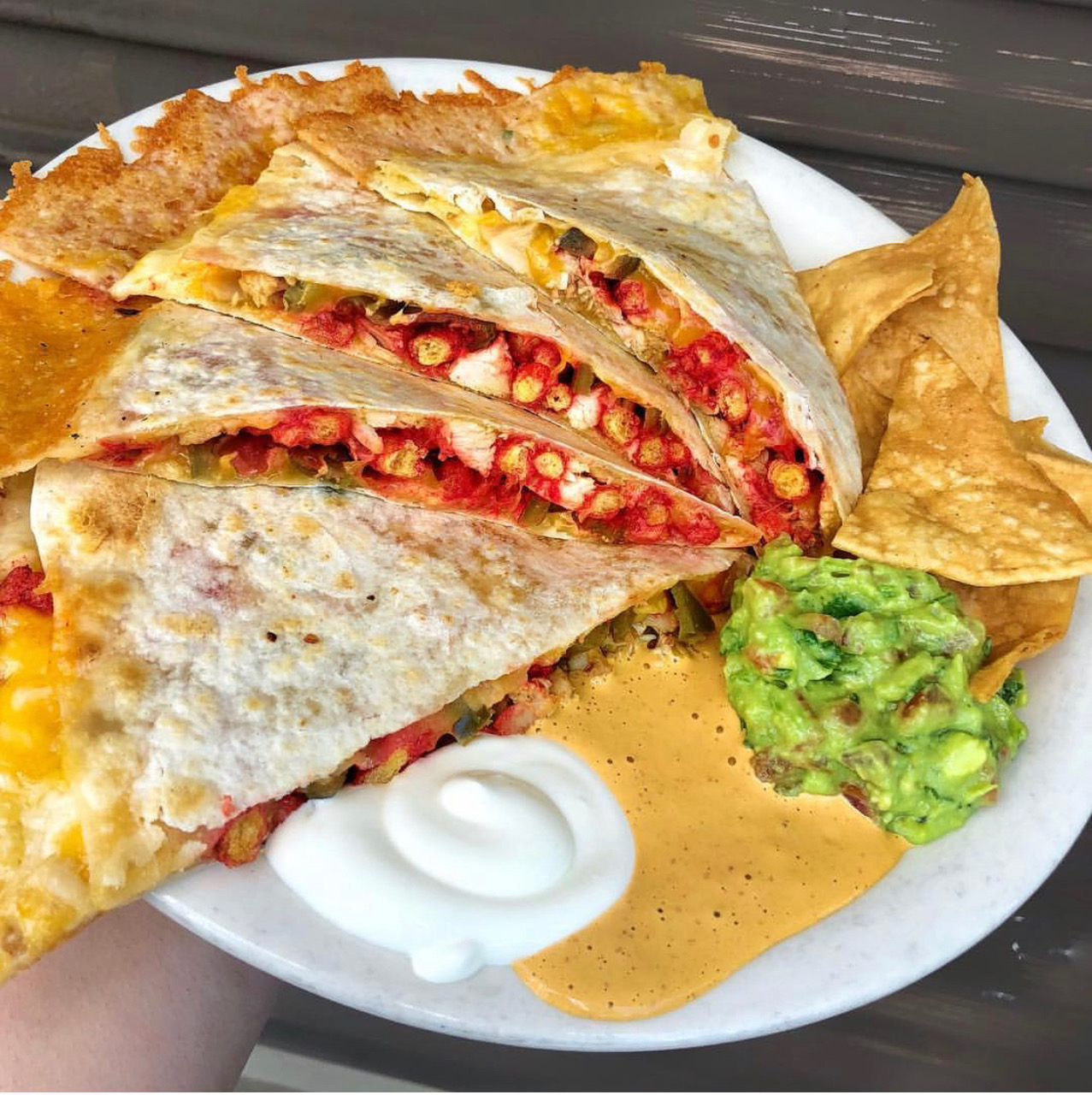 Order Flaming hot cheetos quesadilla  food online from Cilantro Lime store, Los Angeles on bringmethat.com