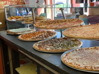 Order Regular Slice food online from New York Pizza & Family Restaurant store, Tannersville on bringmethat.com