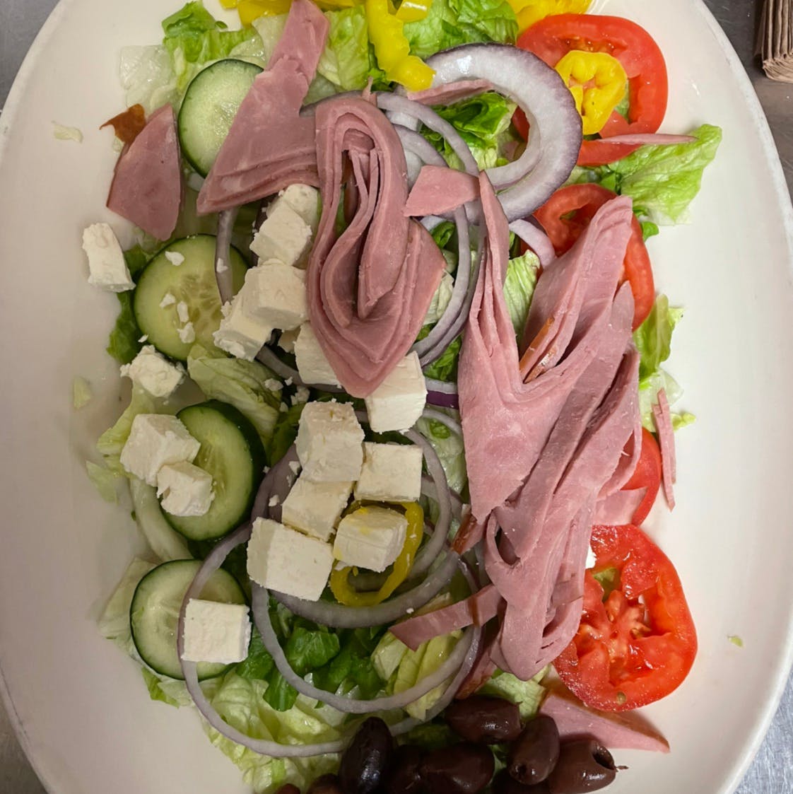 Order Greek Salad - Salad food online from Casa Nostra Italian Cuisine store, Greeneville on bringmethat.com
