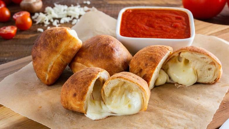 Order Garlic Cheese Rolls (6) food online from Ameci Pizza & Pasta store, Los Alamitos on bringmethat.com