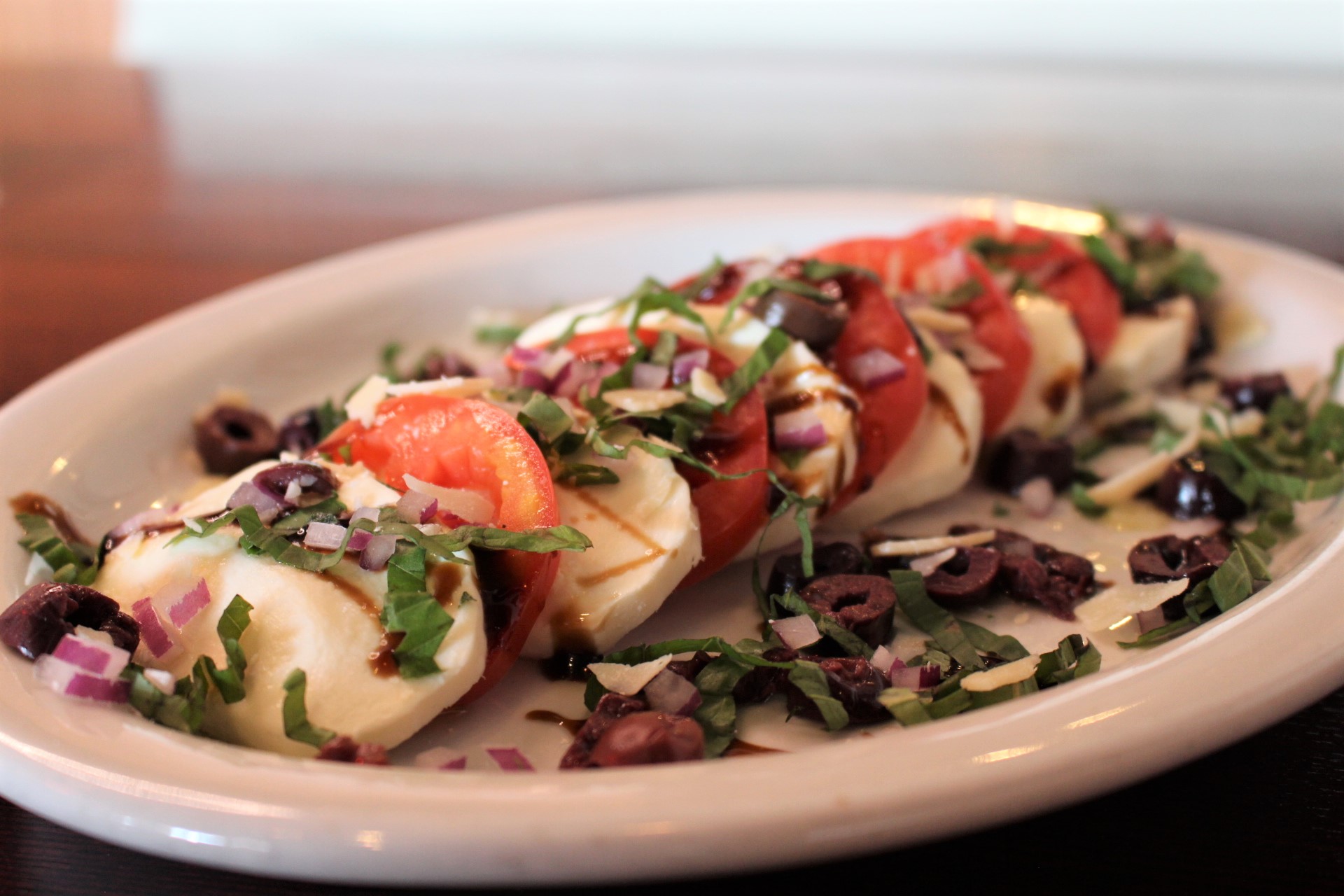 Order Caprese Salad food online from Streets Of New York store, Chandler on bringmethat.com