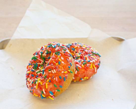 Order Cherry Cake with Rainbow Sprinkles food online from Baked N Denver store, Denver on bringmethat.com