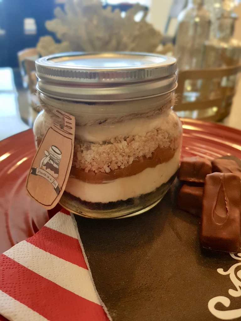 Order 8oz Snicker Cheesecake food online from Heaven In A Jar store, Sugar Land on bringmethat.com