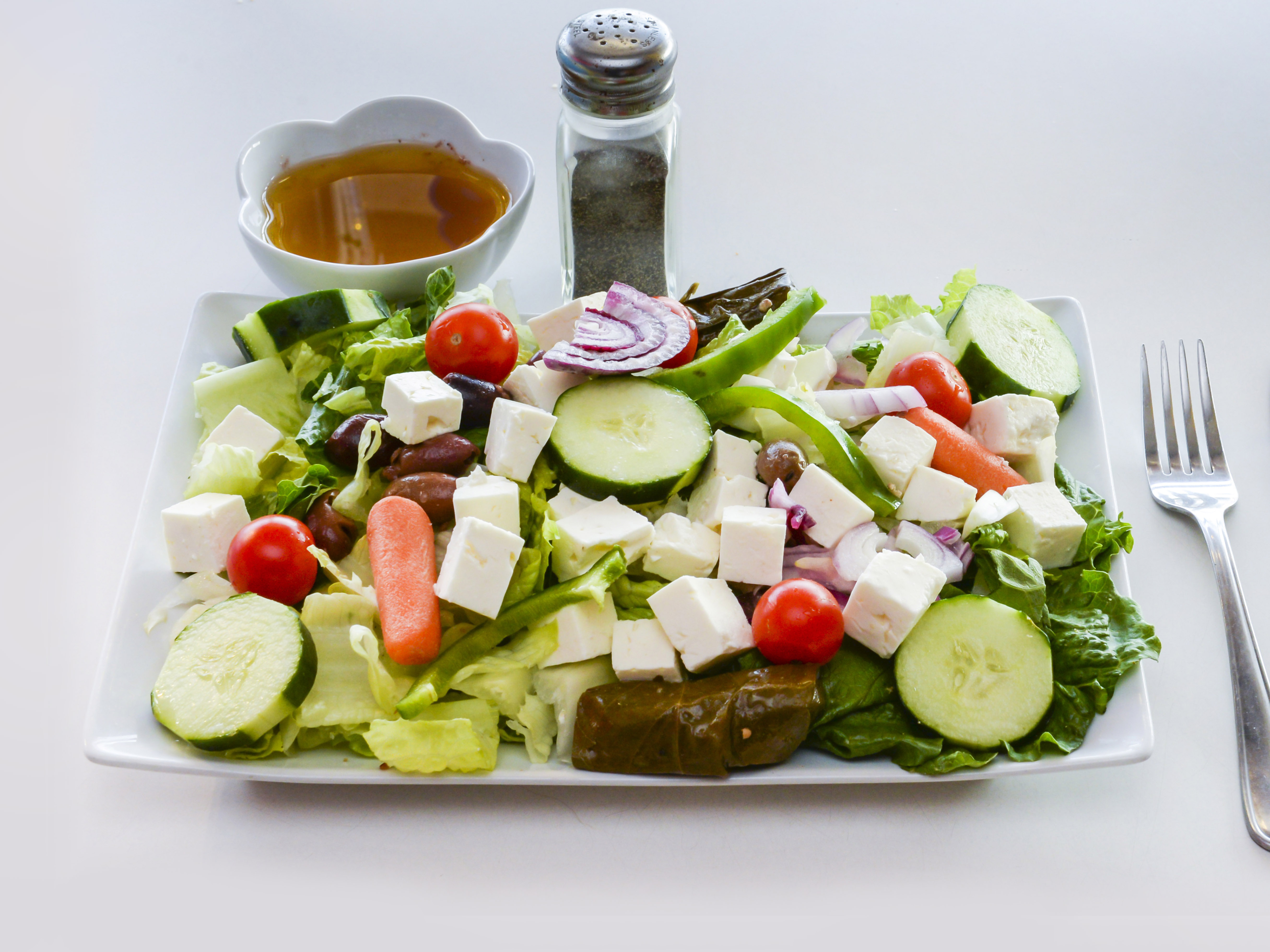 Order Greek Salad food online from Blue Moon Pizza store, Cape May on bringmethat.com