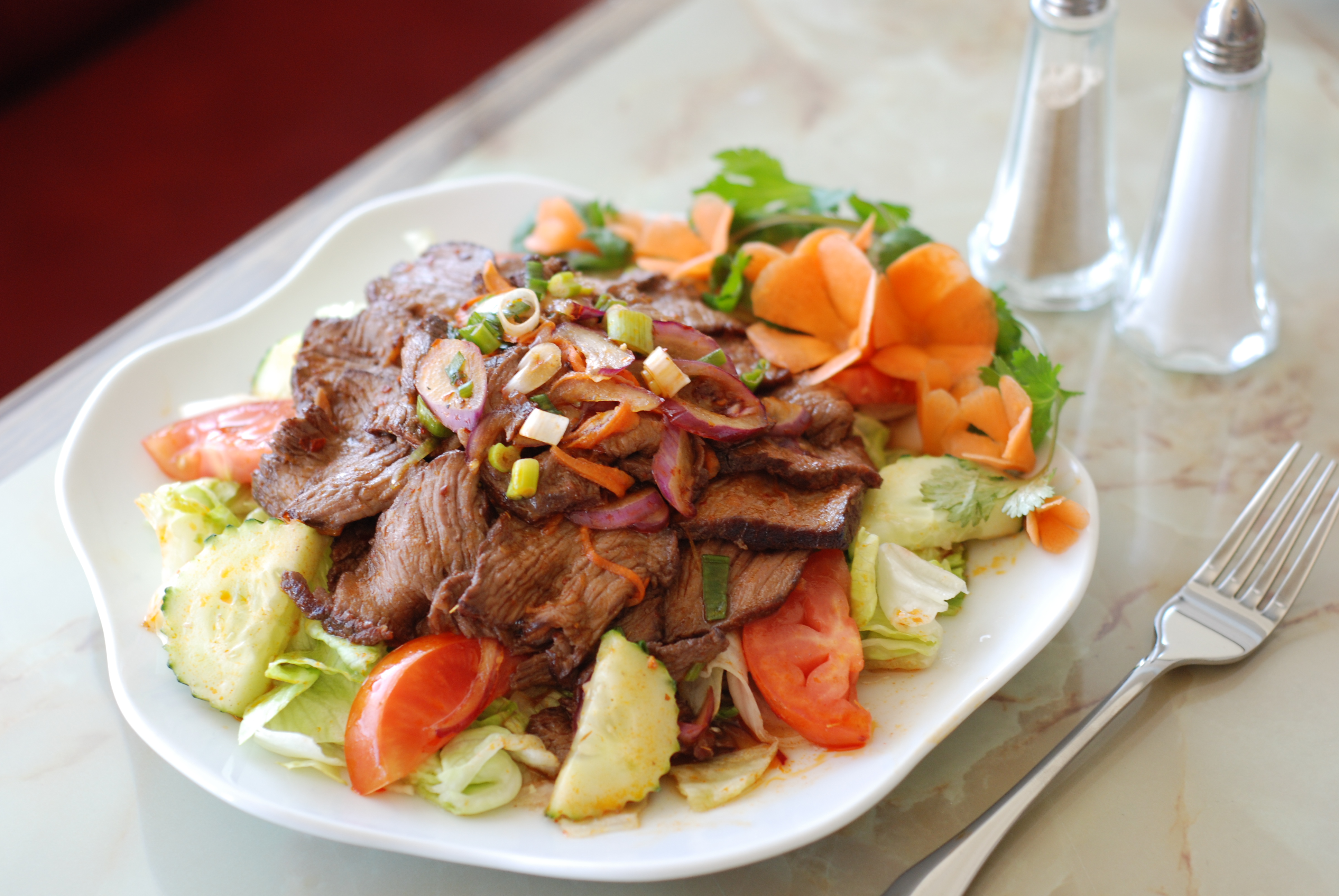 Order Beef Salad food online from Thai Fiesta Cafe store, Paramount on bringmethat.com