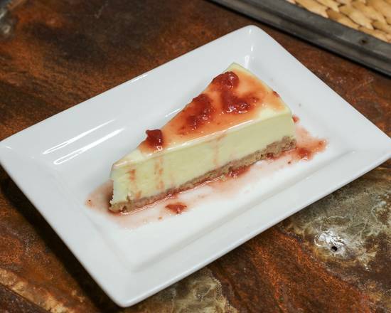 Order New York Style Cheesecake food online from Cafe Zodiac Bar & Grill store, Kennesaw on bringmethat.com