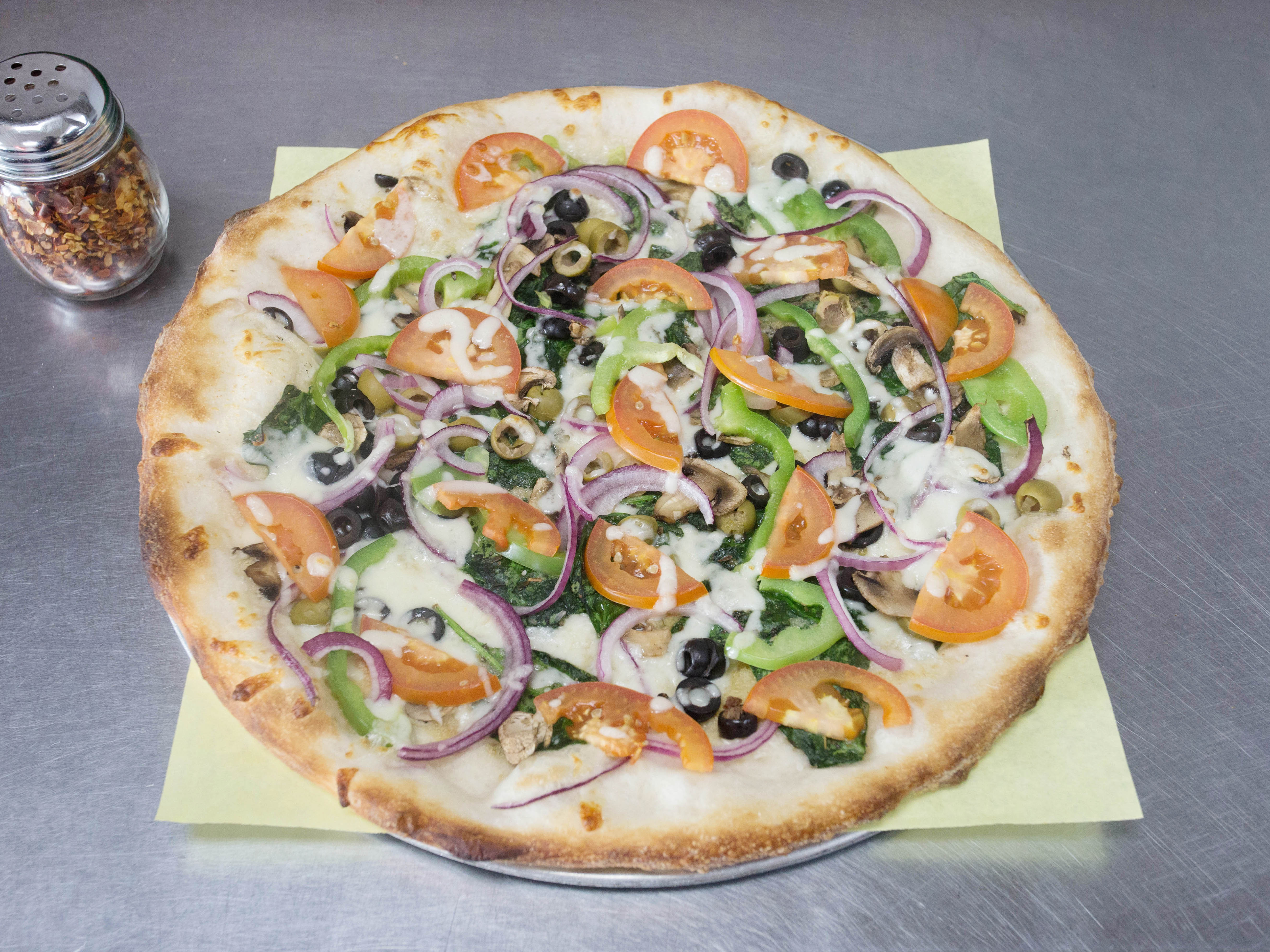 Order Veggie Pizza (White) food online from Yaghi Pizzeria store, San Antonio on bringmethat.com