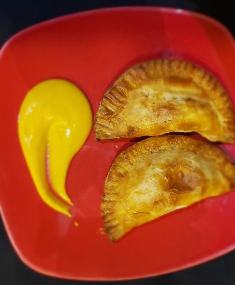 Order Two Chicken Empanadas with Huancaina sauce food online from Lima store, Concord on bringmethat.com