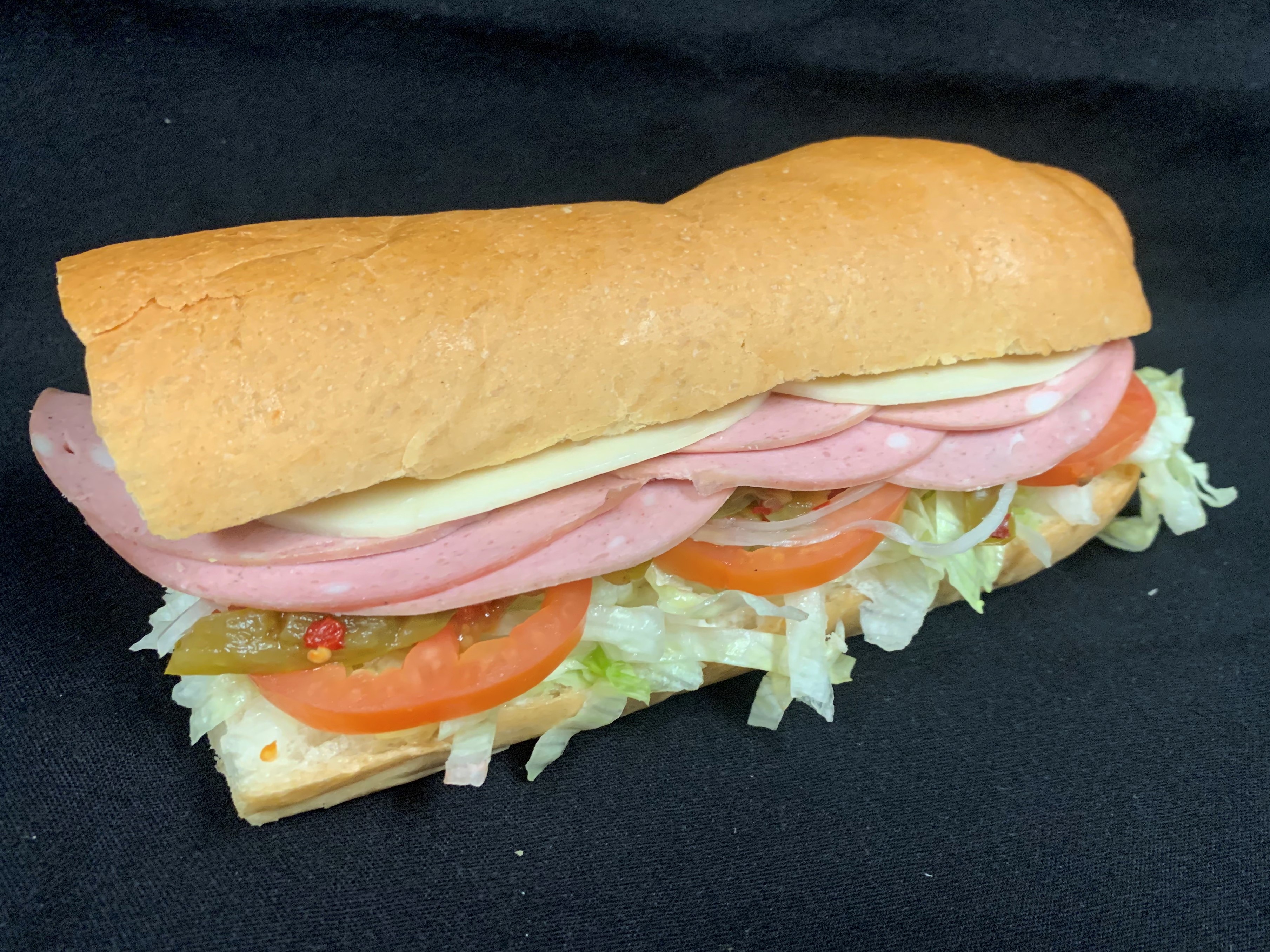 Order 8. Mortedella and Cheese Sub food online from Tony Subs & Pizza store, Inglewood on bringmethat.com