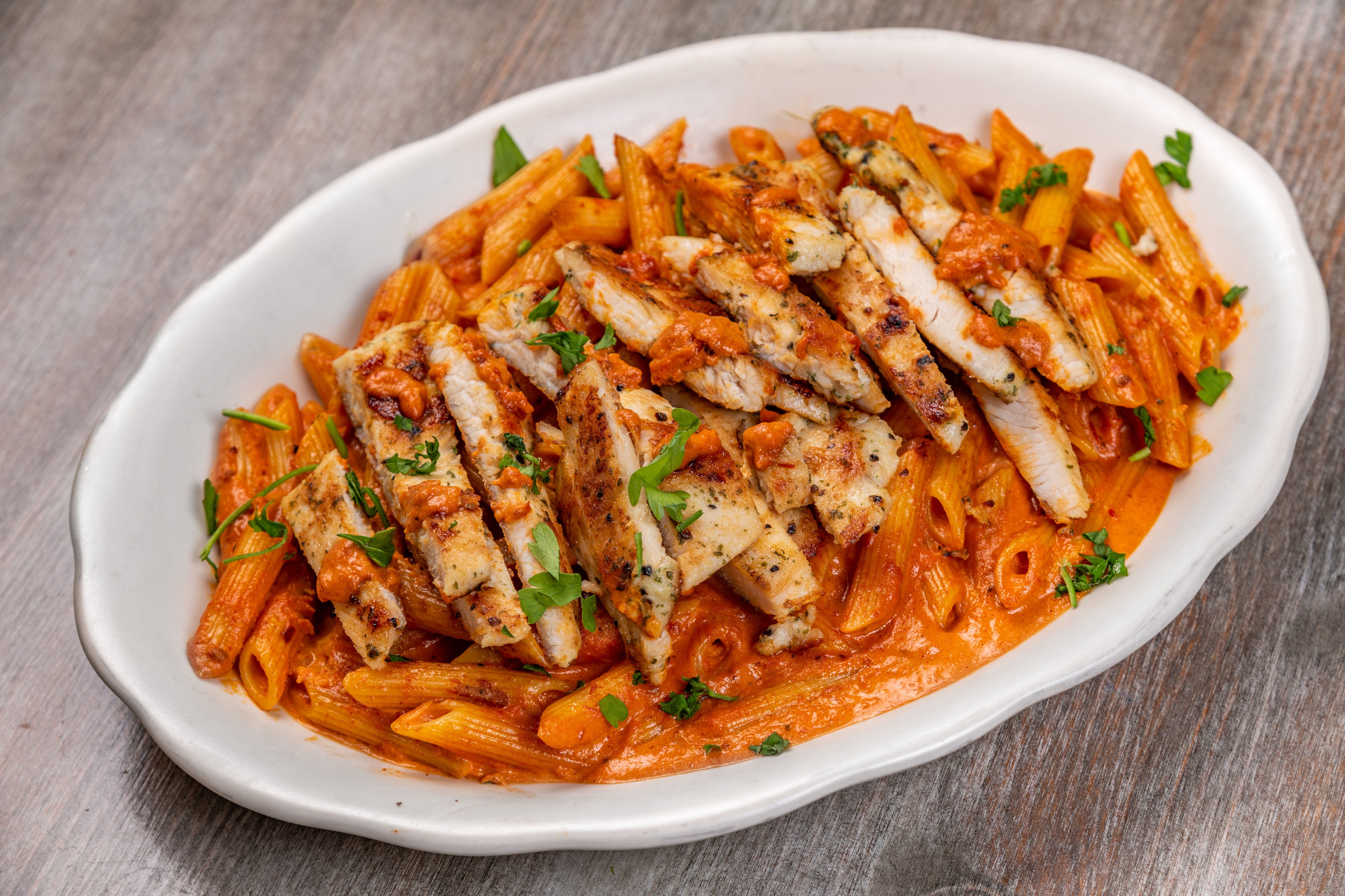 Order Penne A La Vodka with Grilled Chicken - Pasta food online from Master Pizza store, Bogota on bringmethat.com