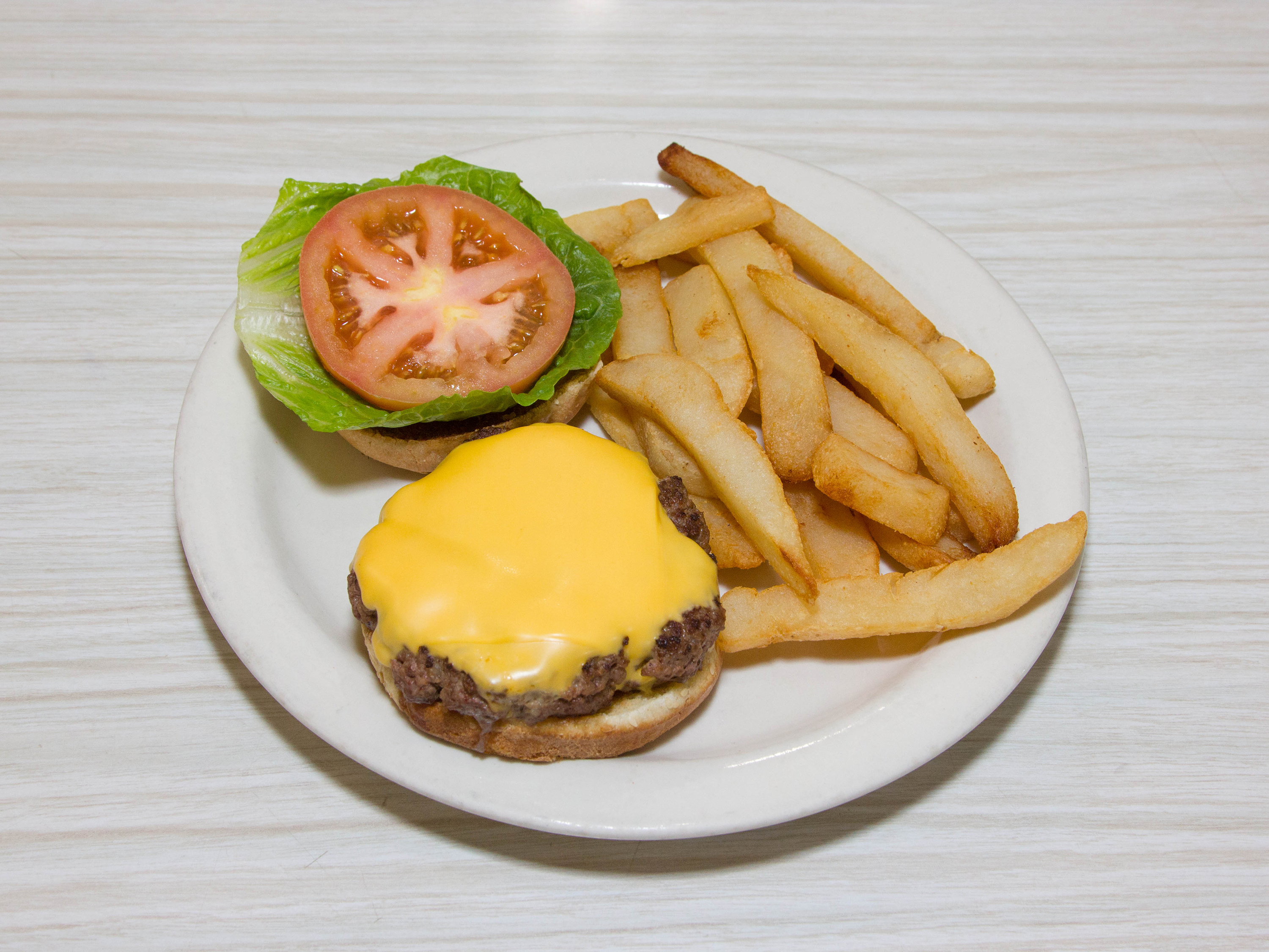 Order Cheeseburger Deluxe food online from West Main Luncheonette store, Bergenfield on bringmethat.com