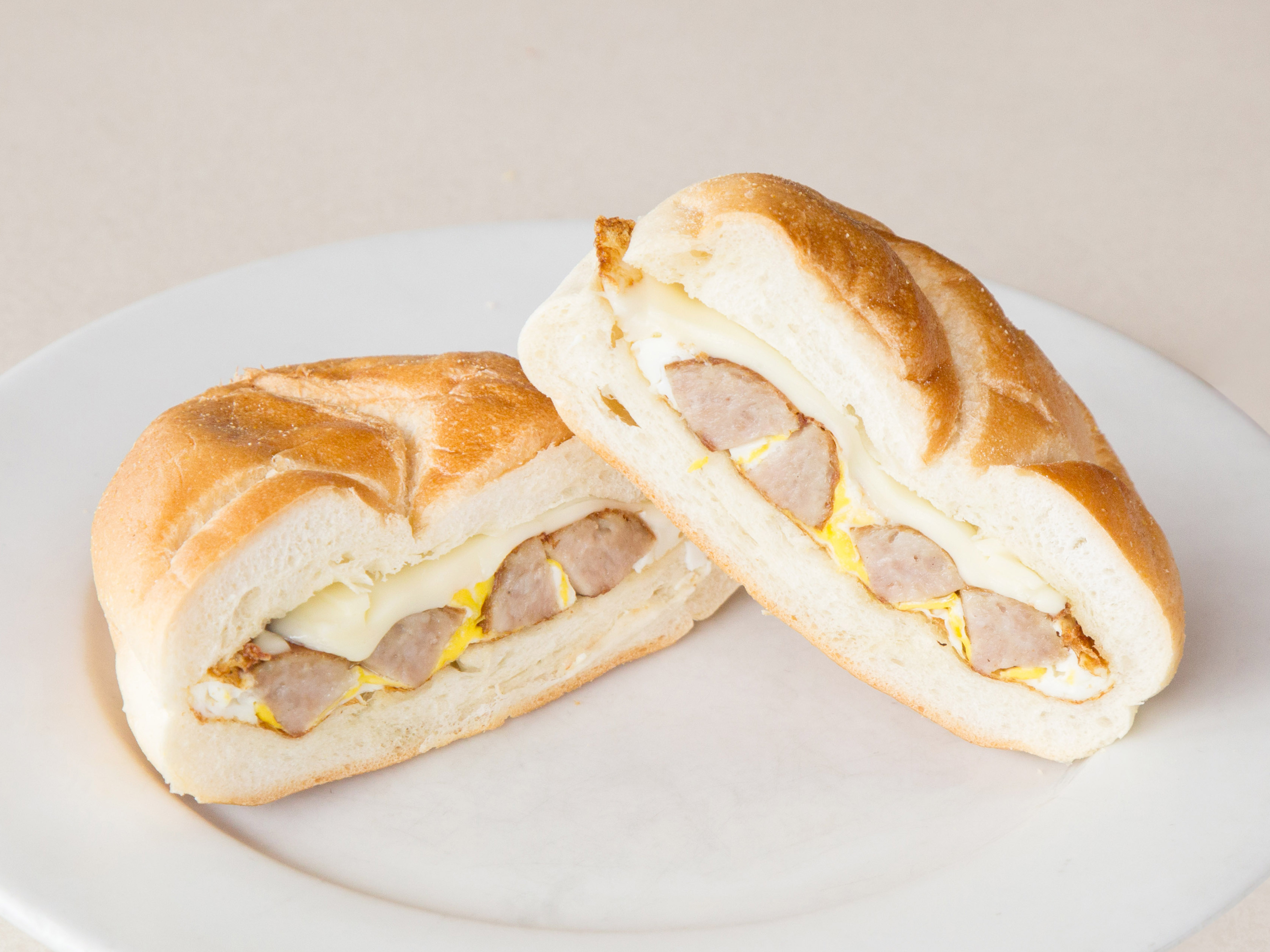 Order Sausage Egg and Cheese on a Roll food online from White Street Deli store, Danbury on bringmethat.com