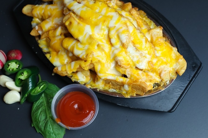 Order Cheesy Fries food online from The Brickyard store, Woburn on bringmethat.com