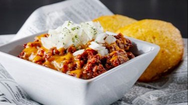 Order Beer Braised Chili and Corn Bread (cup) food online from Remedy's - St. Rose Pkwy store, Henderson on bringmethat.com