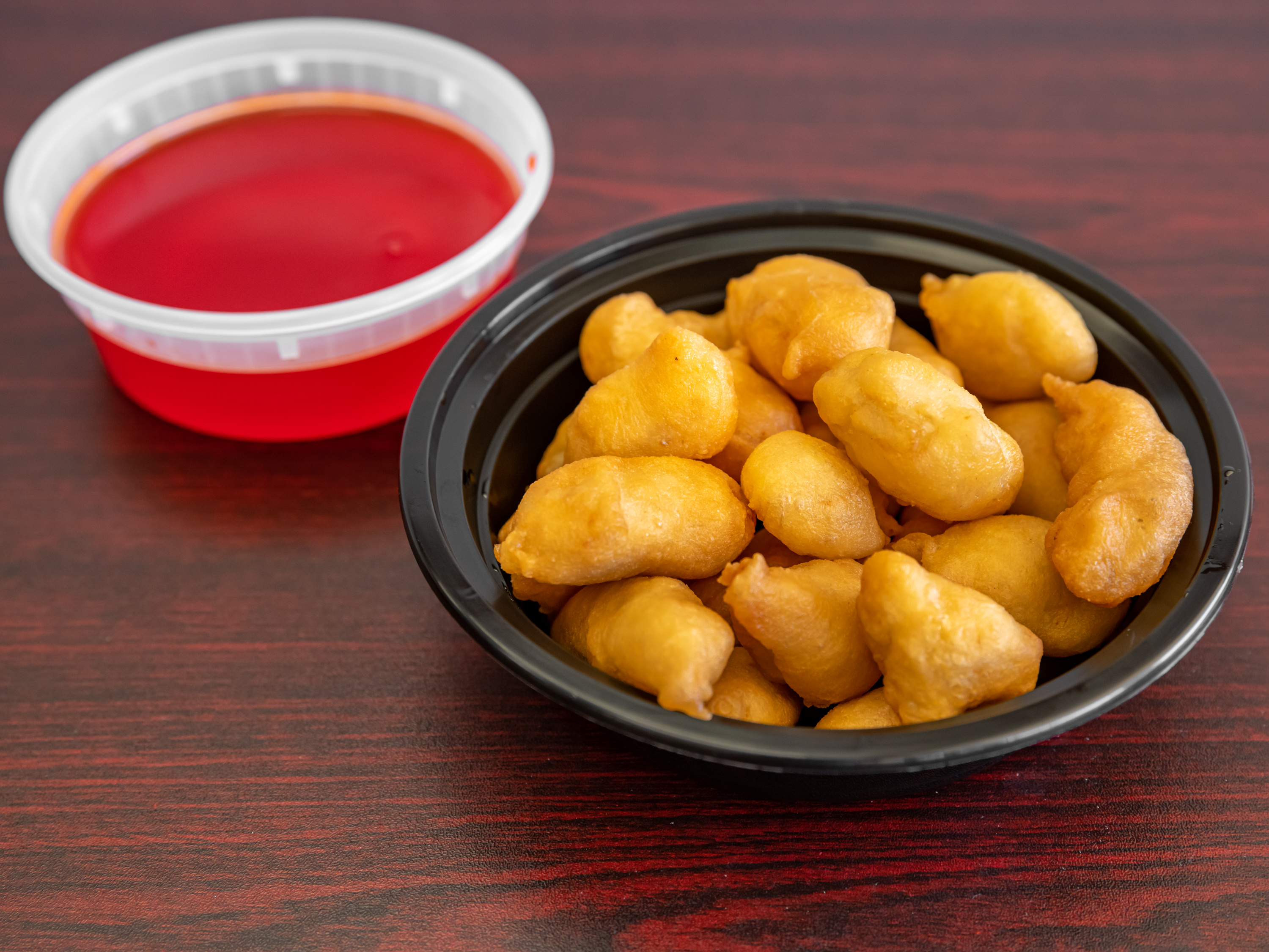 Order 39. Sweet and Sour Chicken food online from China King Chinese Restaurant store, Royal Palm Beach on bringmethat.com