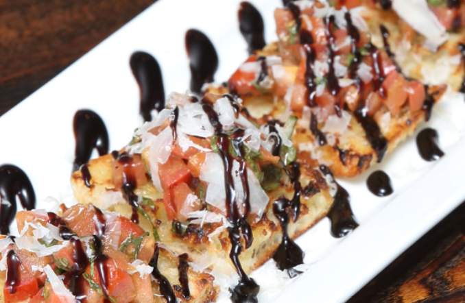 Order Bruschetta food online from Tj Woodfire Pizza store, San Clemente on bringmethat.com