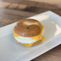 Order Toasted Bagel Sandwich with Egg and Cheese  food online from Simply Vanilla Gourmet store, Lynchburg on bringmethat.com