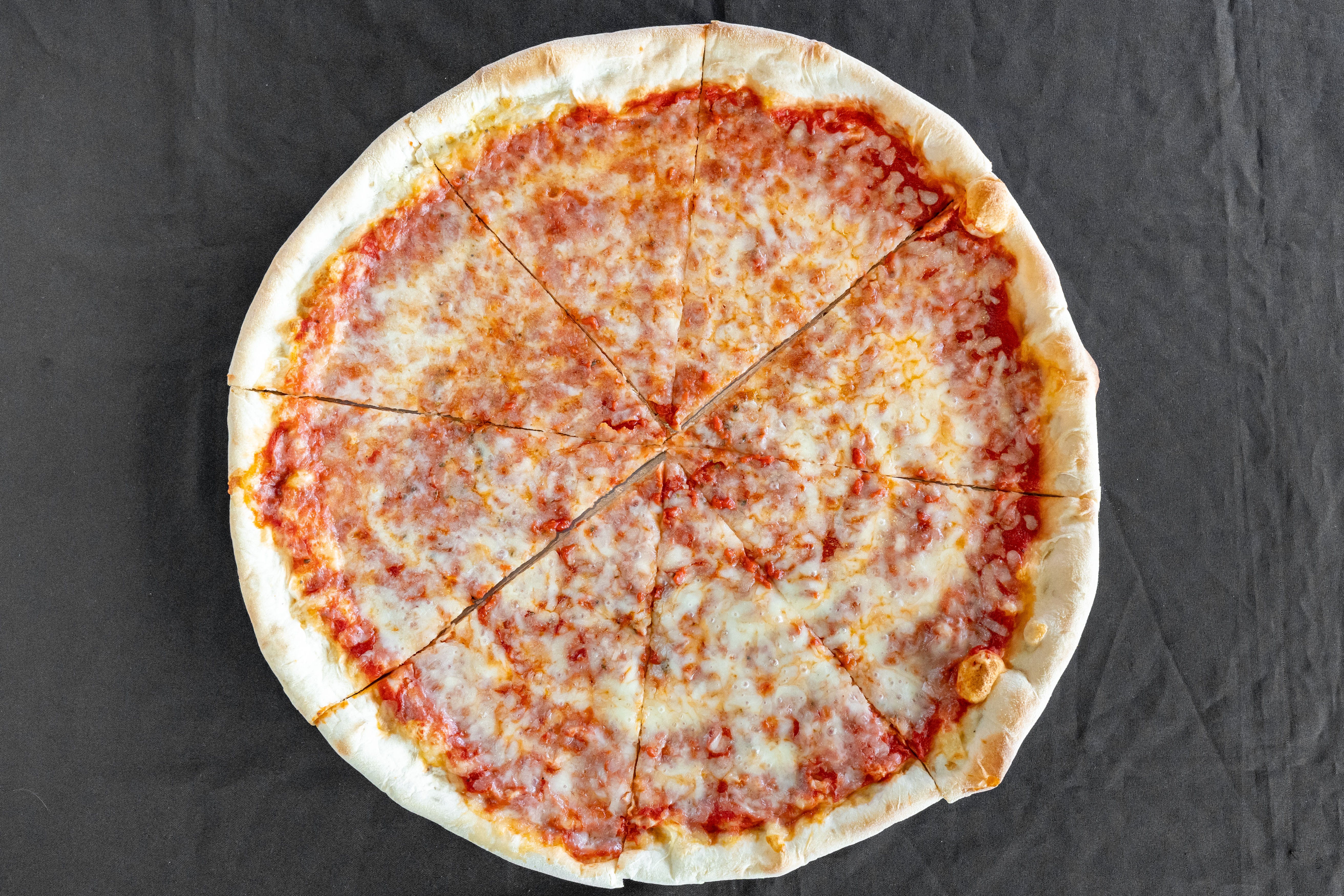 Order Cheese Pizza - Medium 14" food online from Pizza Plaza Of Warminster store, Warminster on bringmethat.com