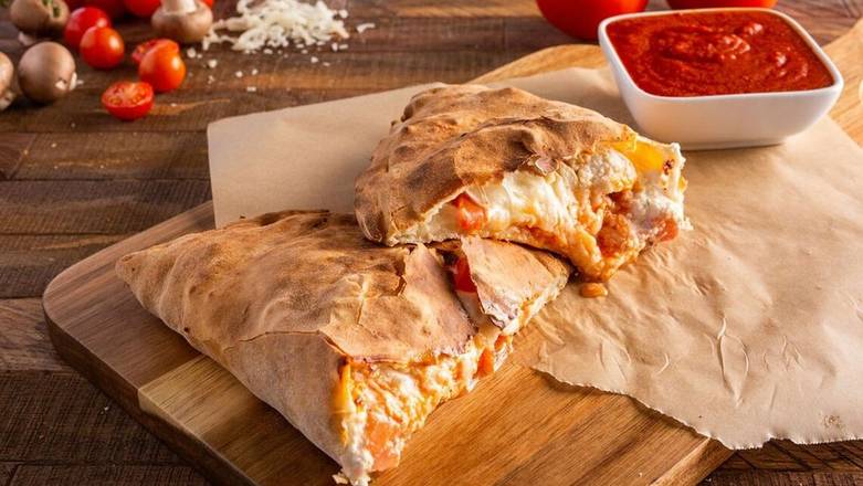 Order Spicy Chicken Calzone food online from Ameci Pizza & Pasta store, Los Alamitos on bringmethat.com