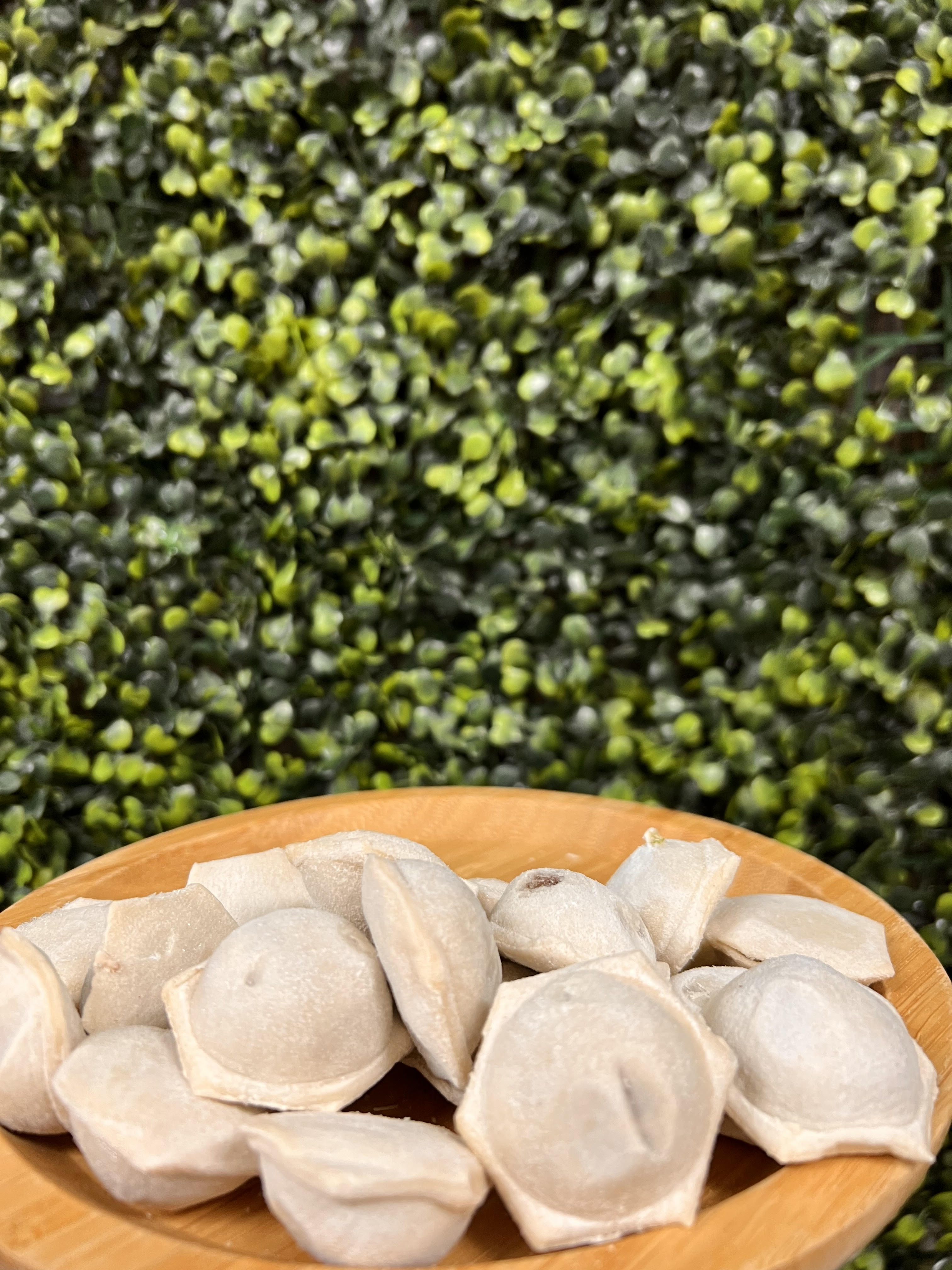 Order Pelmeni Beef 1 lb (34 Pieces) food online from Ossys Bakery store, Glendale on bringmethat.com