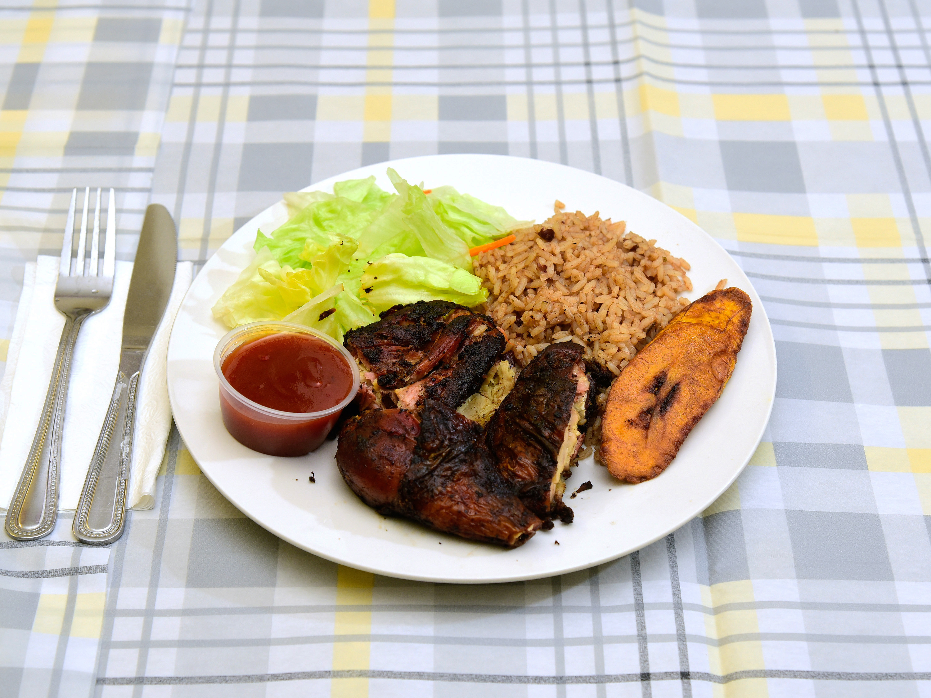 Order Jerk Chicken food online from Yaad Style Jamaican Restaurant store, Rochester on bringmethat.com