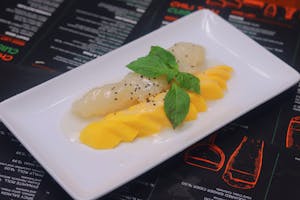 Order 48. Mango Sweet Sticky Rice food online from Miko Thai Kitchen store, Hudson on bringmethat.com