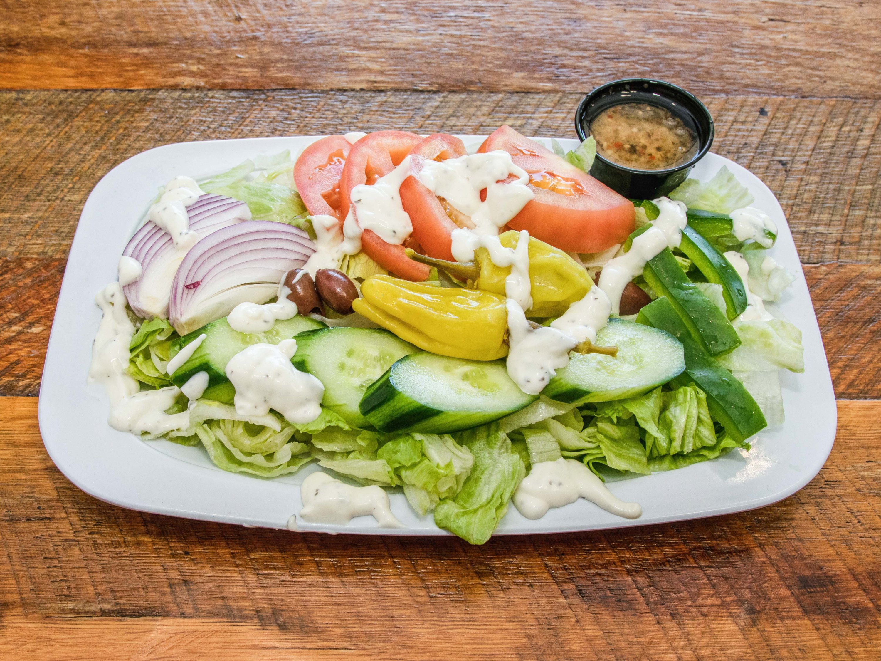Order Garden Salad food online from Duccinis Pizza store, Falls Church on bringmethat.com