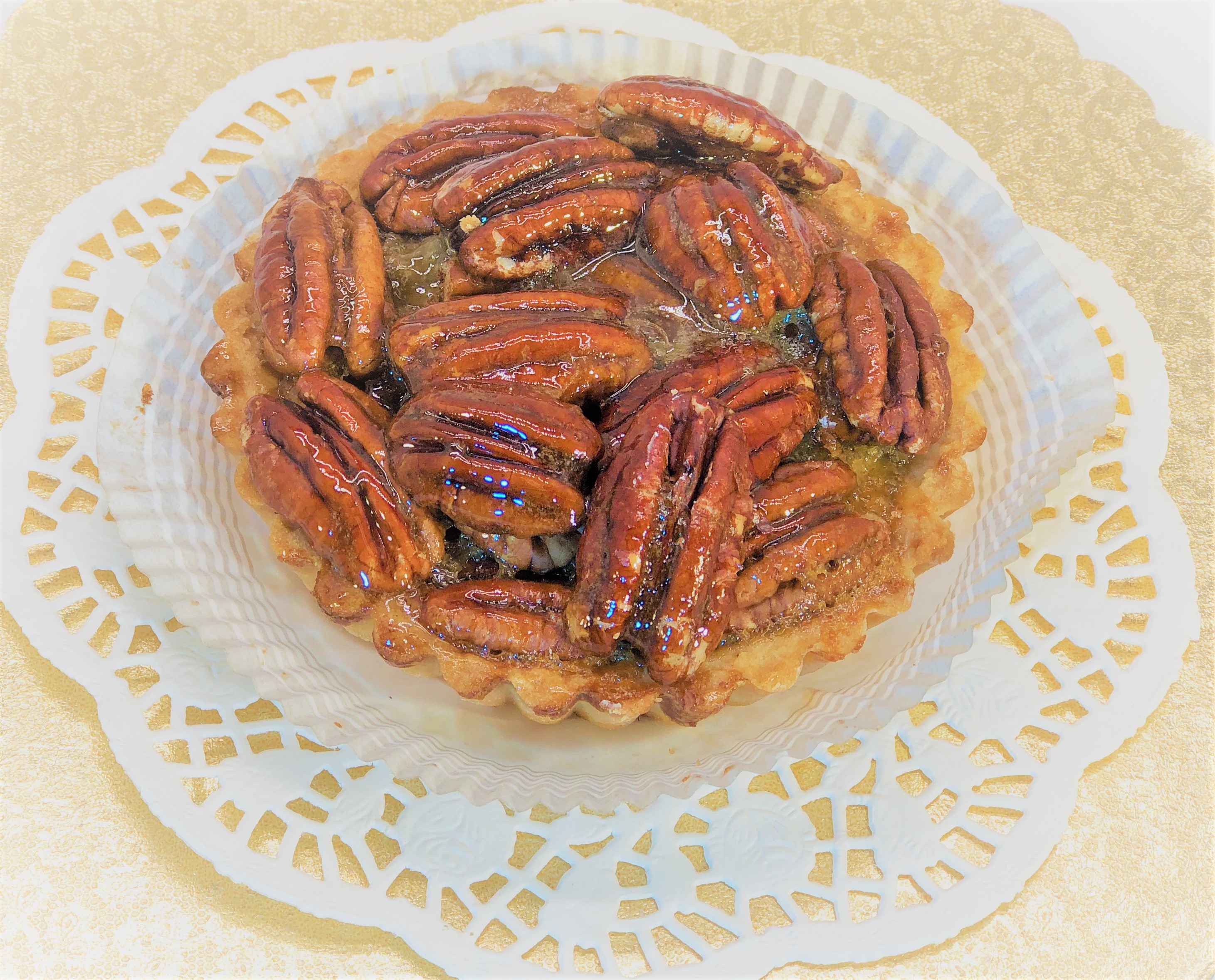 Order Pecan Tart Pastry food online from Palace Bakery store, Laguna Hills on bringmethat.com