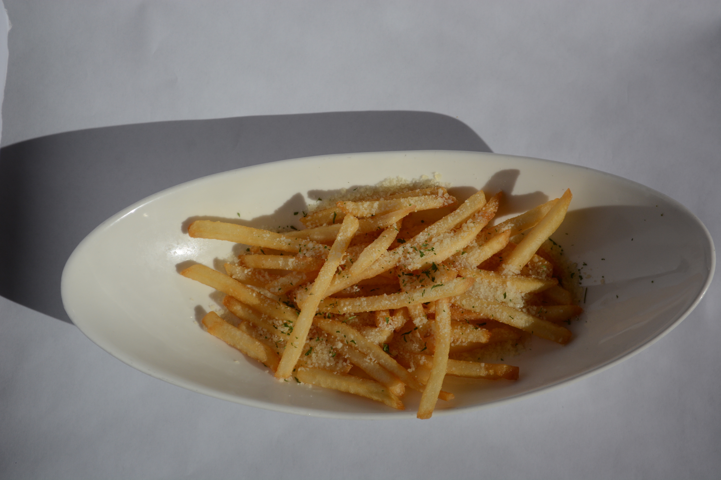 Order Large Truffle Parmesan fries food online from The Colorado Vegetarian Kitchen store, Golden on bringmethat.com