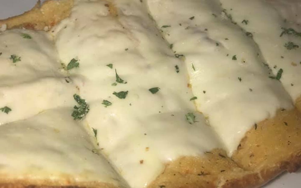 Order Garlic Bread with Cheese - Appetizer food online from Bellissimo store, Colleyville on bringmethat.com