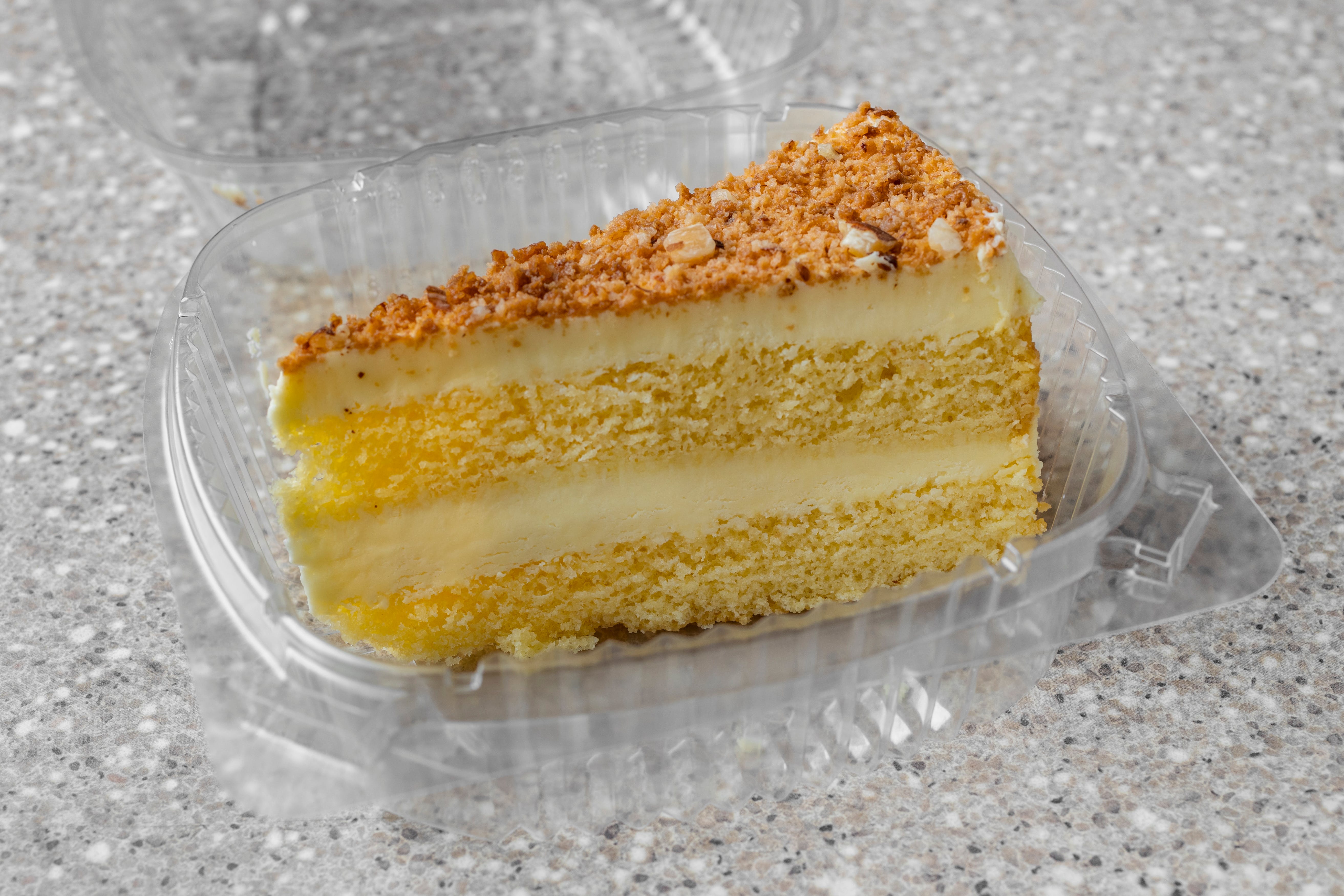 Order Toasted Almond Cake - Slice food online from Campus pizza & gyro store, Hempstead on bringmethat.com