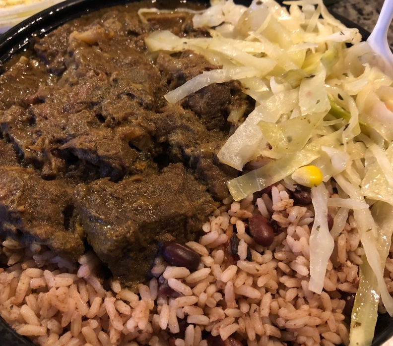 Order Curry Goat with Plain Rice food online from Taste of the Caribbean store, Capitol Heights on bringmethat.com