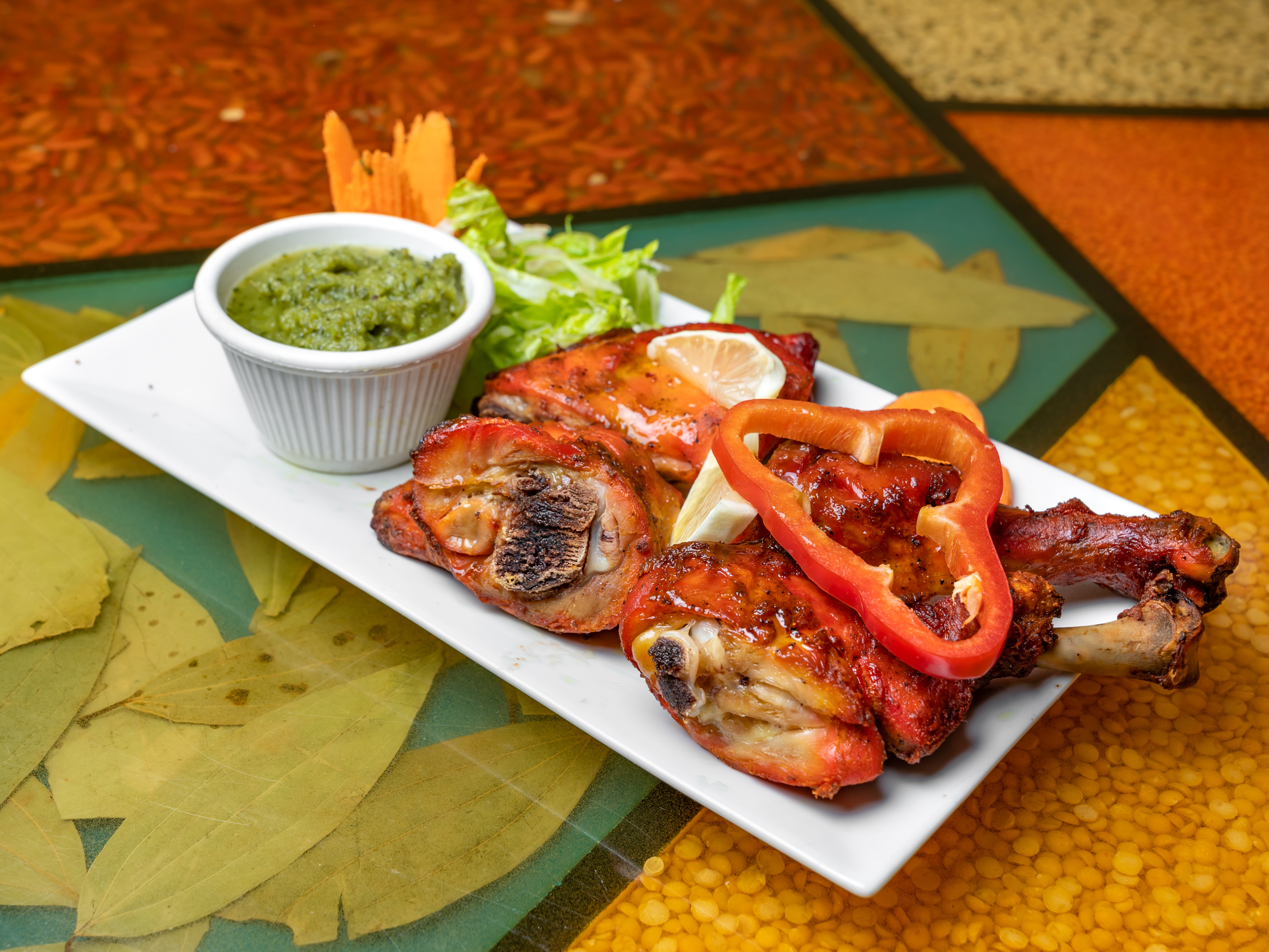 Order Tandoori Chicken Tange food online from Singhs Cafe store, Wellesley Hills on bringmethat.com