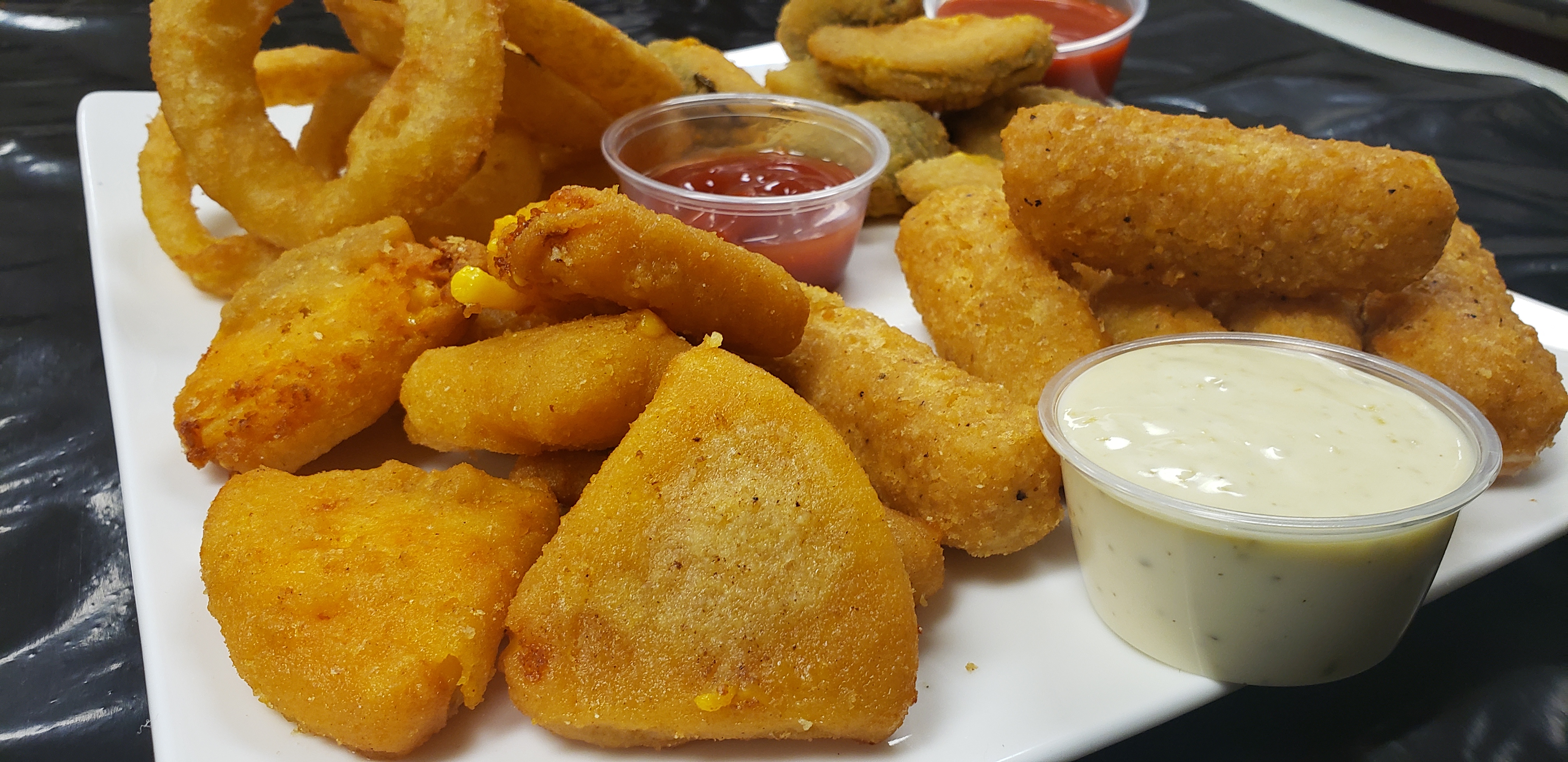 Order Mozzarella Sticks food online from Fries To Wings store, Aurora on bringmethat.com