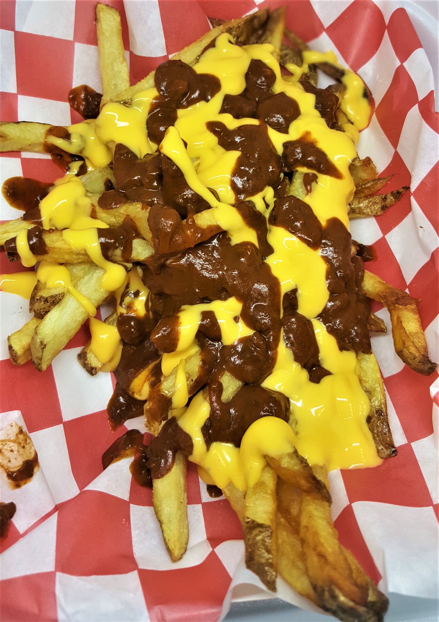 Order CHILI CHEESE FRIES food online from Carnival Cafe store, Owensboro on bringmethat.com