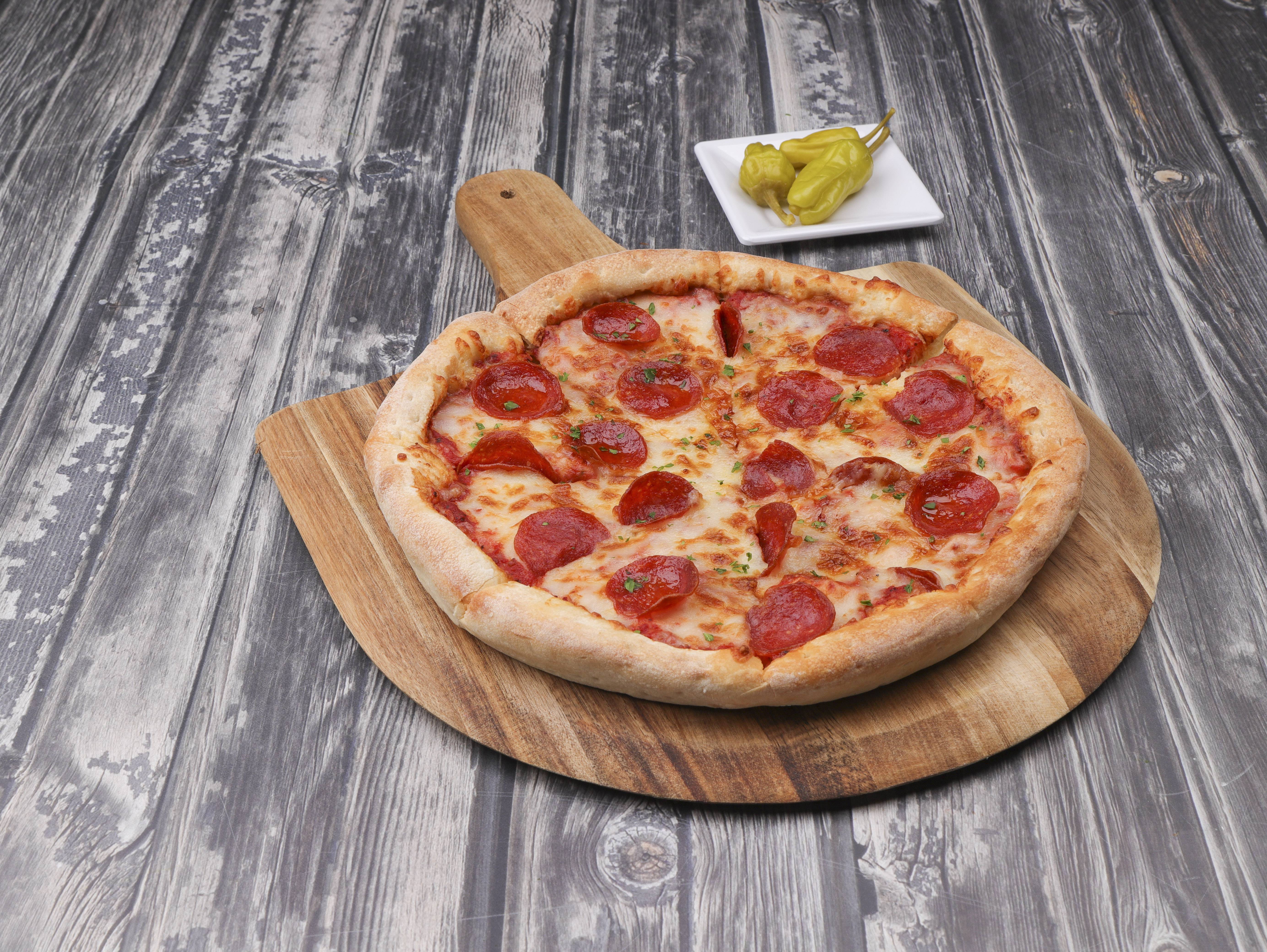 Order 1-Topping Pizza food online from Pizza Pro store, Brewton on bringmethat.com