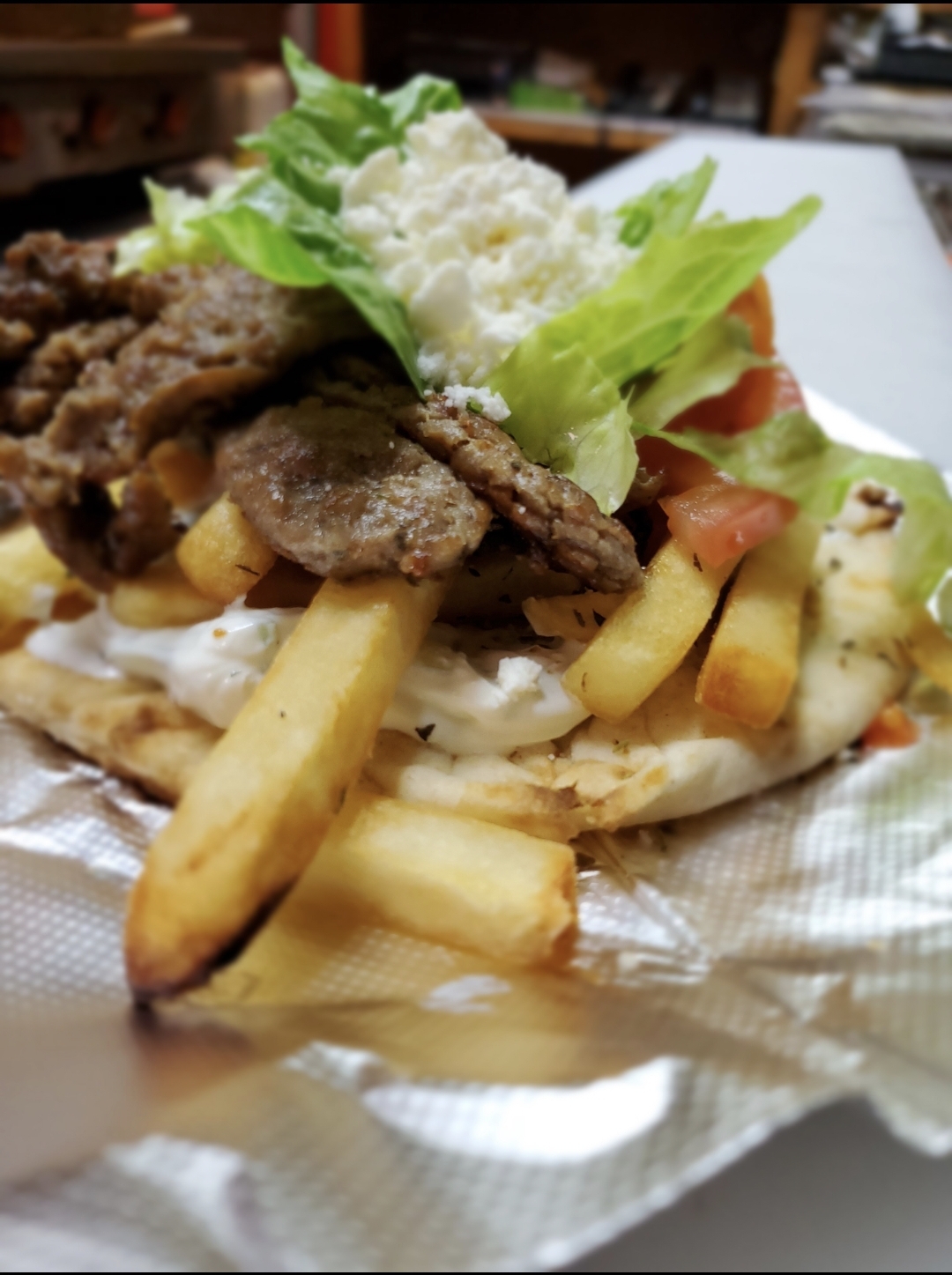 Order Special Gyro food online from Pizzeria Gusto store, Providence on bringmethat.com