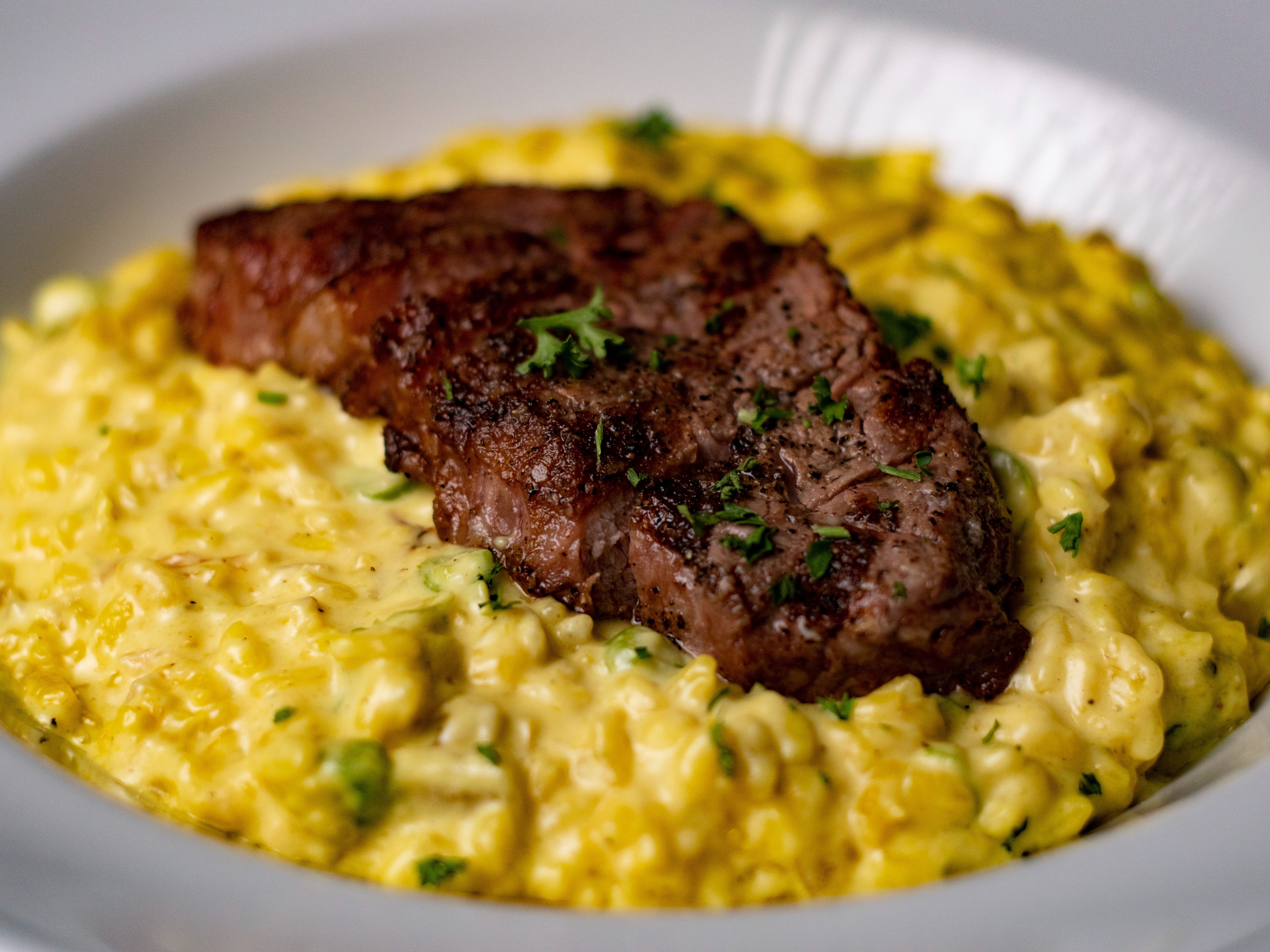 Order New York Steak Risotto food online from La Papillon store, Lancaster on bringmethat.com