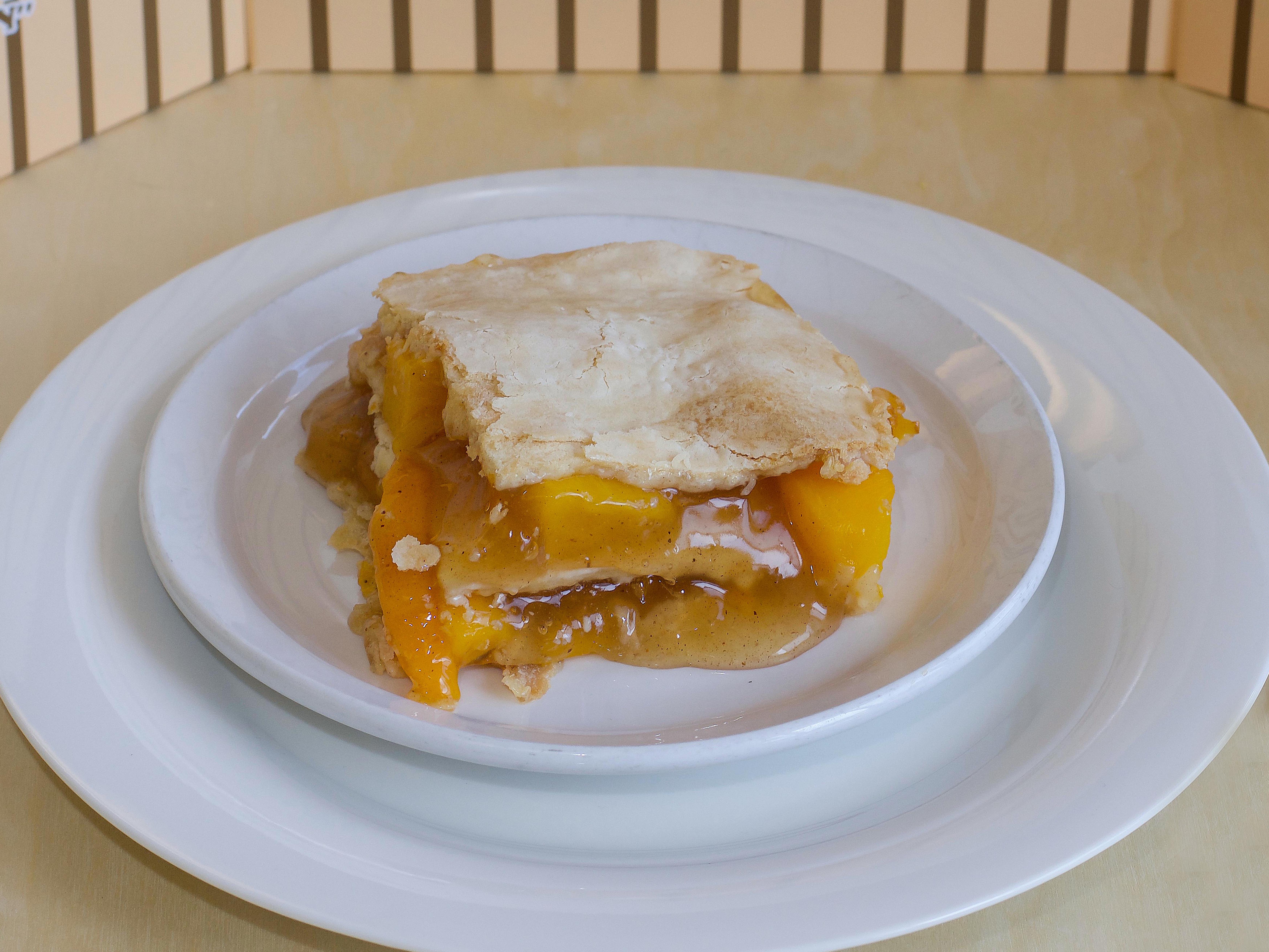 Order Peach Cobbler food online from Prosperous Fried Chicken store, Akron on bringmethat.com