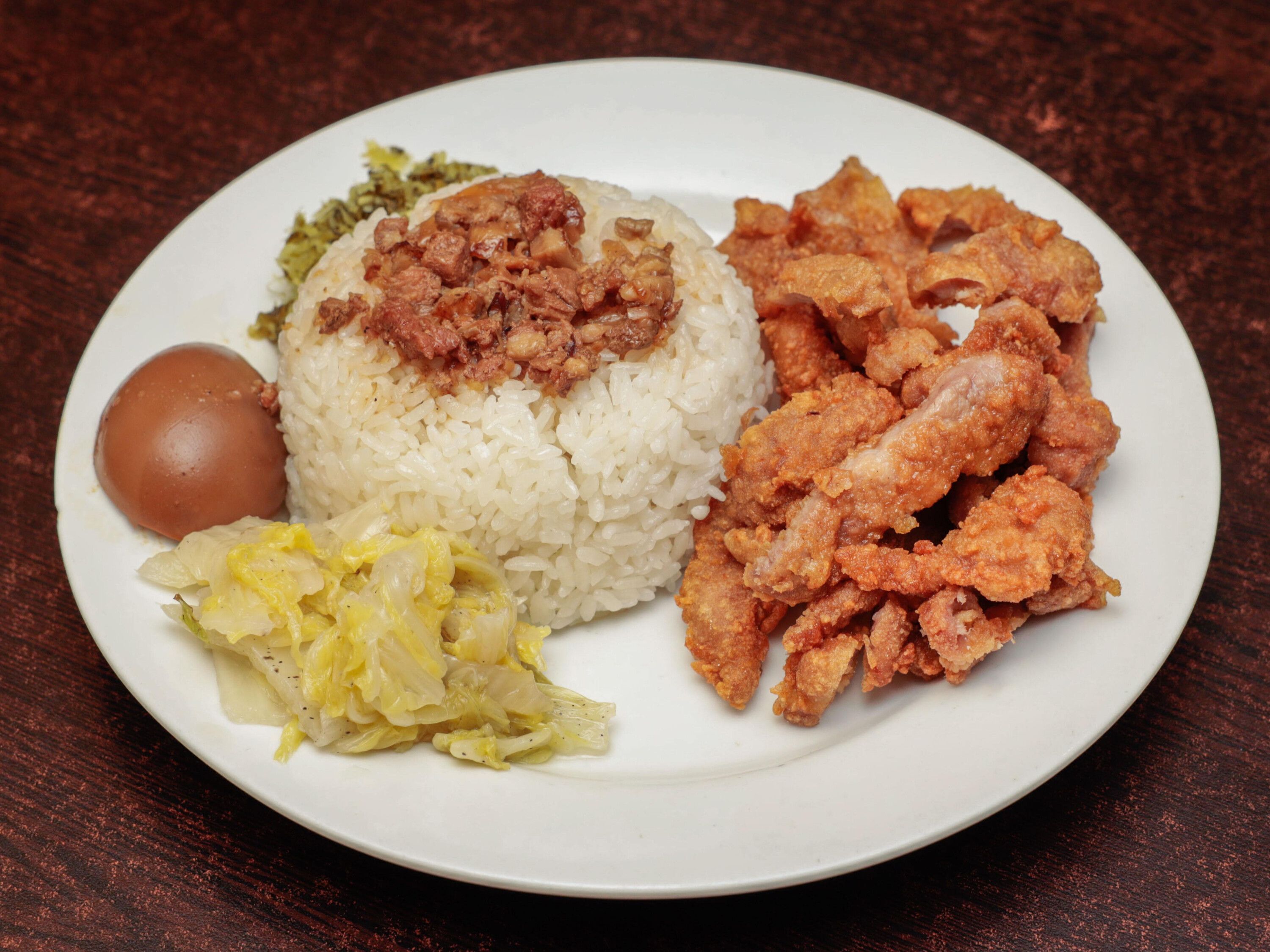 Order Chinese Style Fried Pork Chop with Rice 排骨飯 food online from A&J Bistro 半畝園 store, East Hanover on bringmethat.com