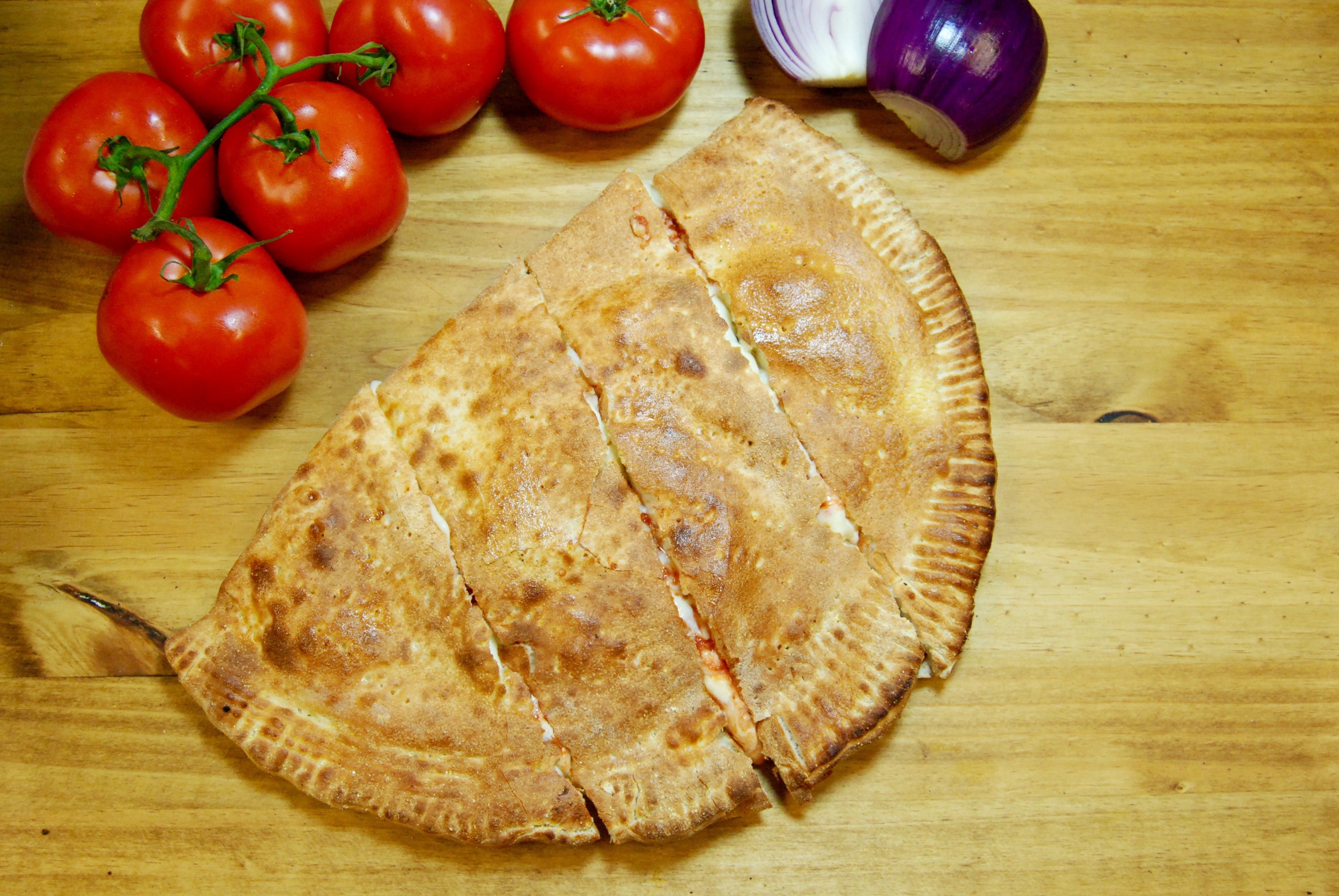Order Calzone - Medium 12" food online from Stefano's Pizza store, Novato on bringmethat.com