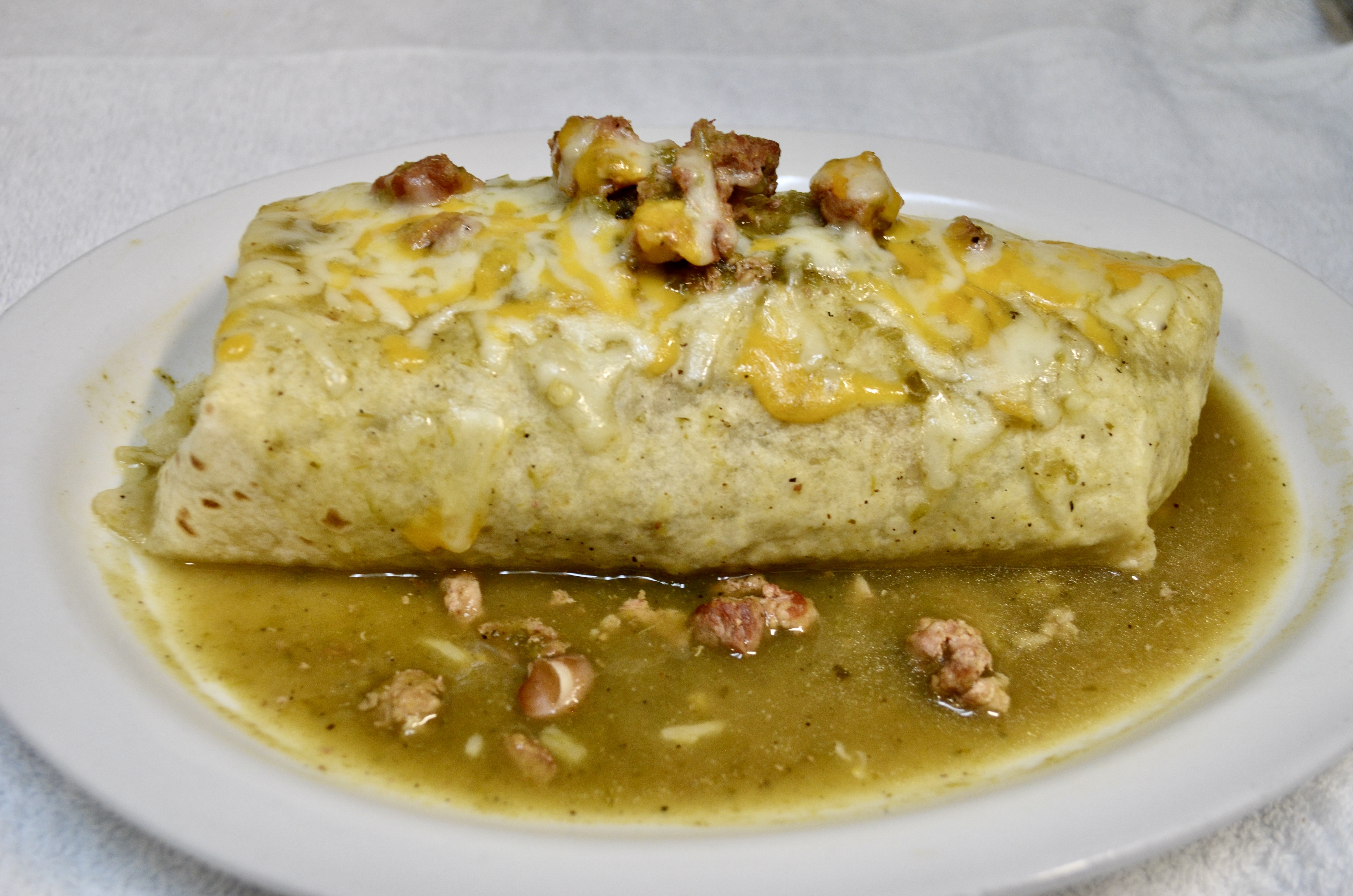 Order Burrito de Carnitas food online from El Amigo store, Golden on bringmethat.com